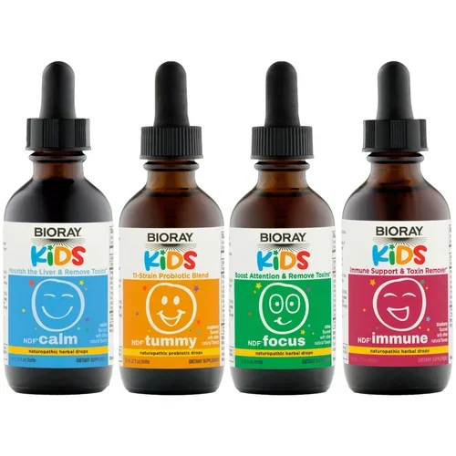 Four brown bottles with droppers labeled for kids' health supplements, including Calm, Tummy, Focus, and Immune, arranged in a row.