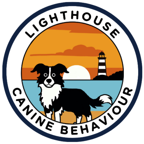 A circular logo with the words 'Lighthouse Canteen Behaviour' around the border. Inside, a dog is standing on a beach near the water with a lighthouse in the background during sunset.