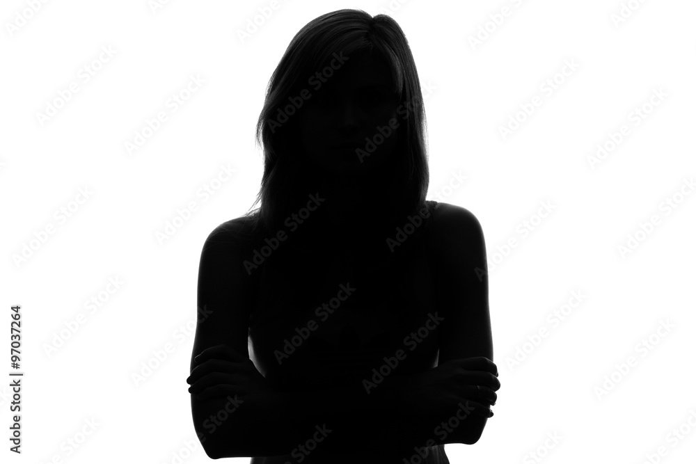 Silhouette of a woman with arms crossed against a white background.