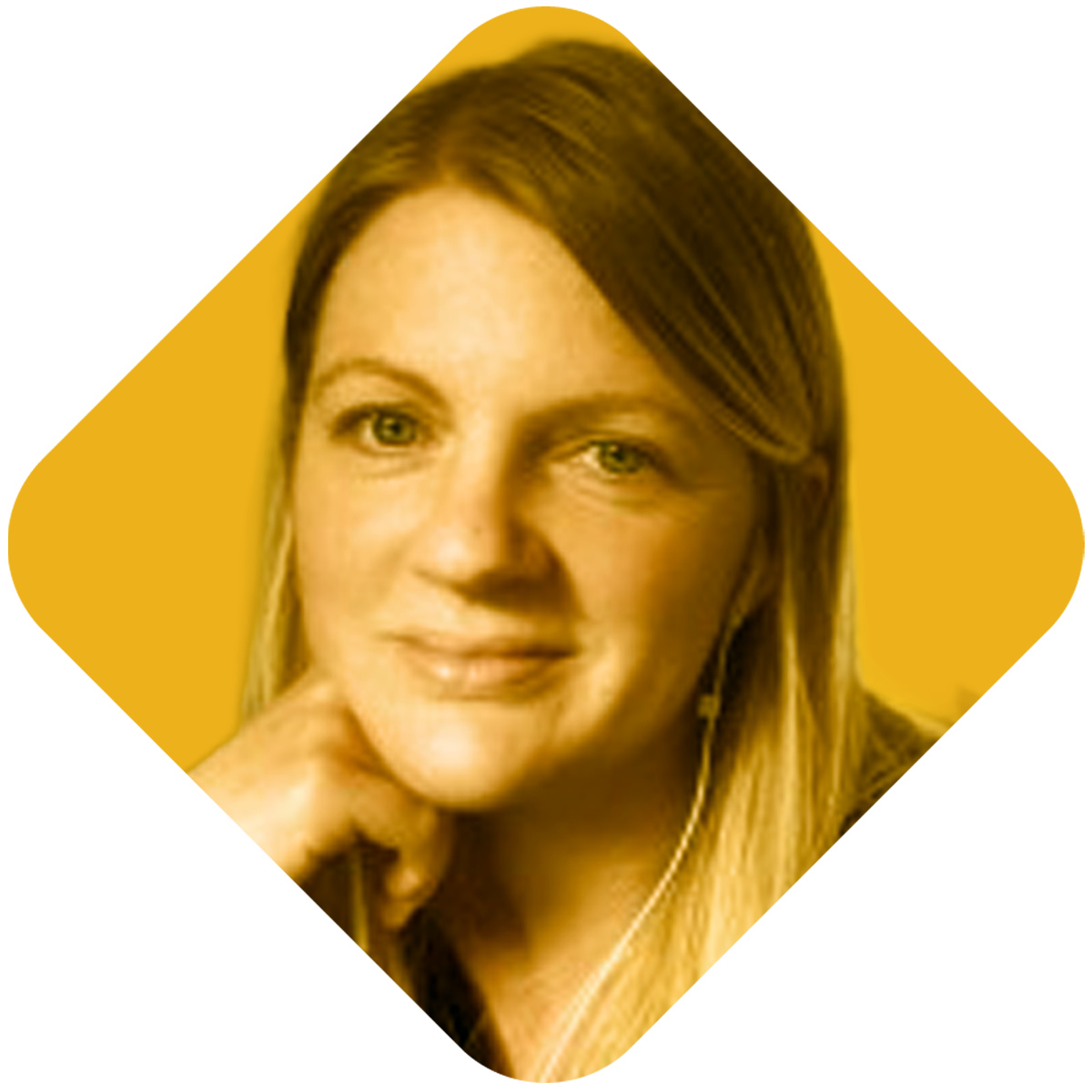 A woman with long, light brown hair and green eyes, smiling and resting her chin on her hand, wearing white earphones, against a yellow background.