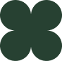 A simple graphic with four dark green circles arranged in a square pattern.