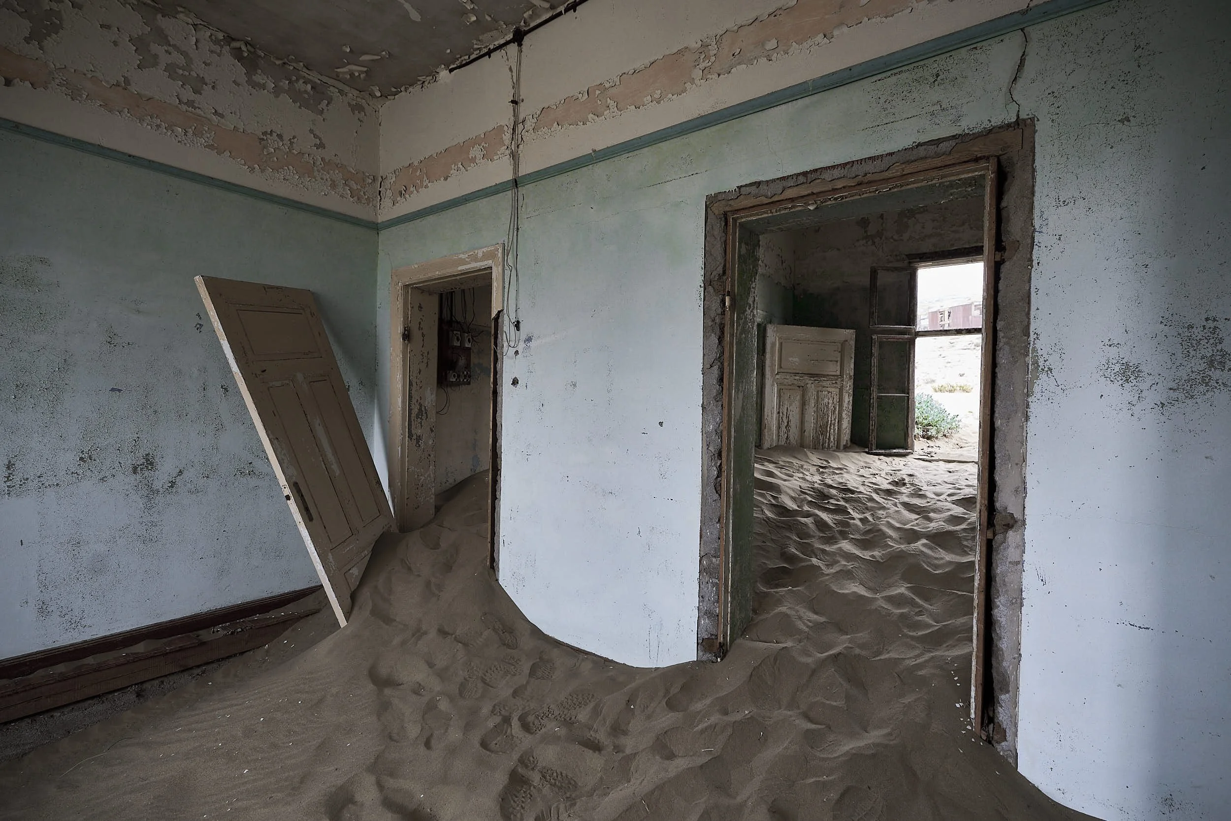 Sand filled Blue Room: Kolmanskop Ghost Town, Namibia