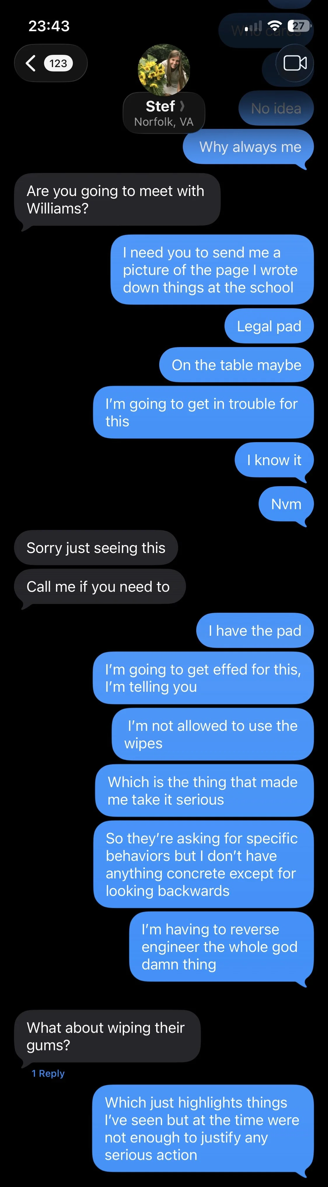 A screenshot of a text message conversation on a phone between multiple people discussing a situation involving a legal pad, wiping gums, and some sort of apparent trouble or protest.