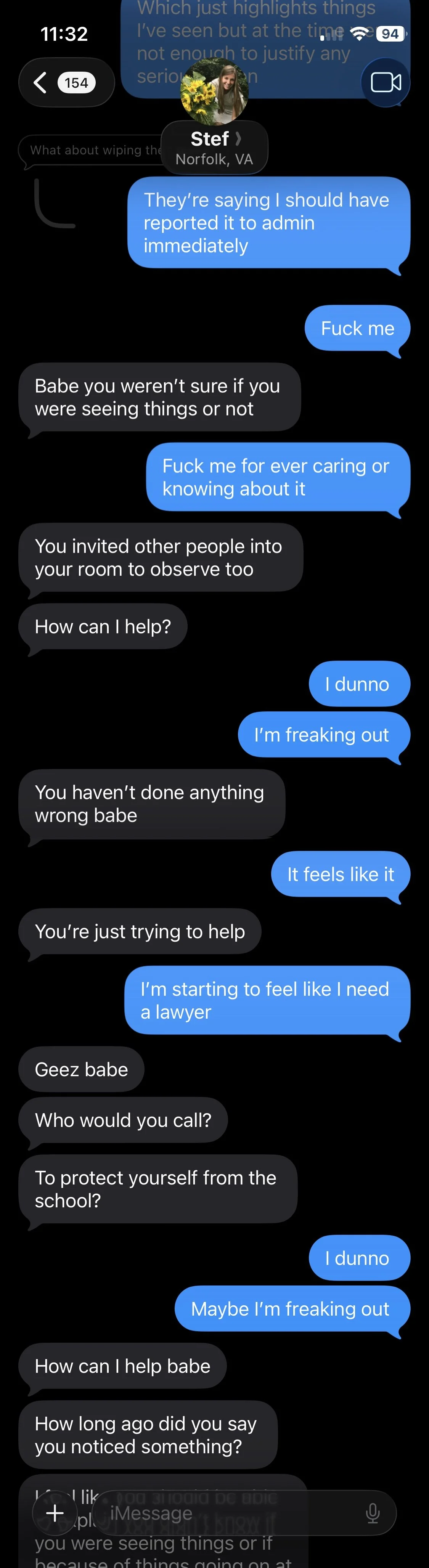 Text message conversation on a phone screen between two people discussing concerns about someone potentially reporting things to the admin, with repeated mentions of feeling freaked out and needing a lawyer.