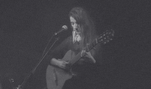 A mostly black or dark gray textured surface