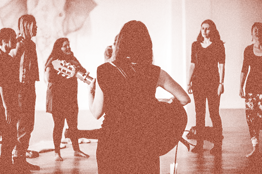 A close-up of a textured reddish-brown surface.