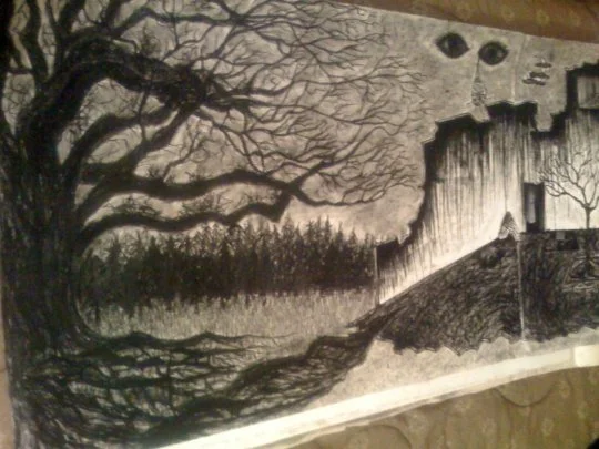 A black and white drawing of a spooky landscape with a large tree, a haunted burnt wall, and a ghostly face in the sky.