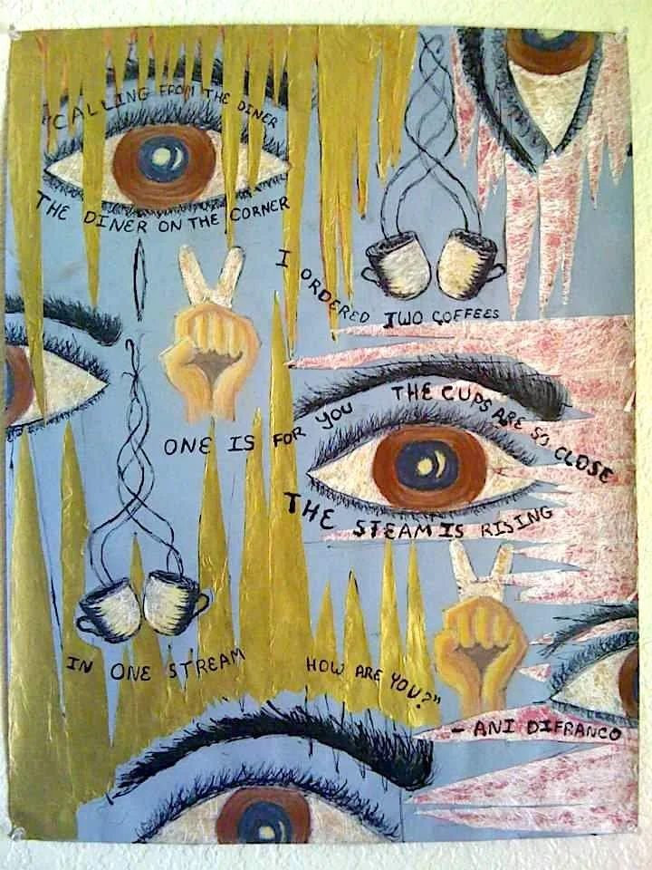 Painting with large eyes, coffee cups, and yellow streaks resembling hair. Contains handwritten text: "Calling from the diner on the corner, I ordered two coffees, one is for you, the cup are so close the steam is rising in one stream, how are you?" 