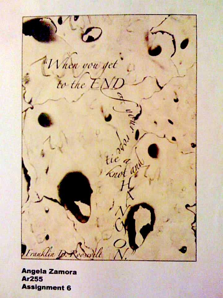A close-up view of a piece of torn paper with handwritten text