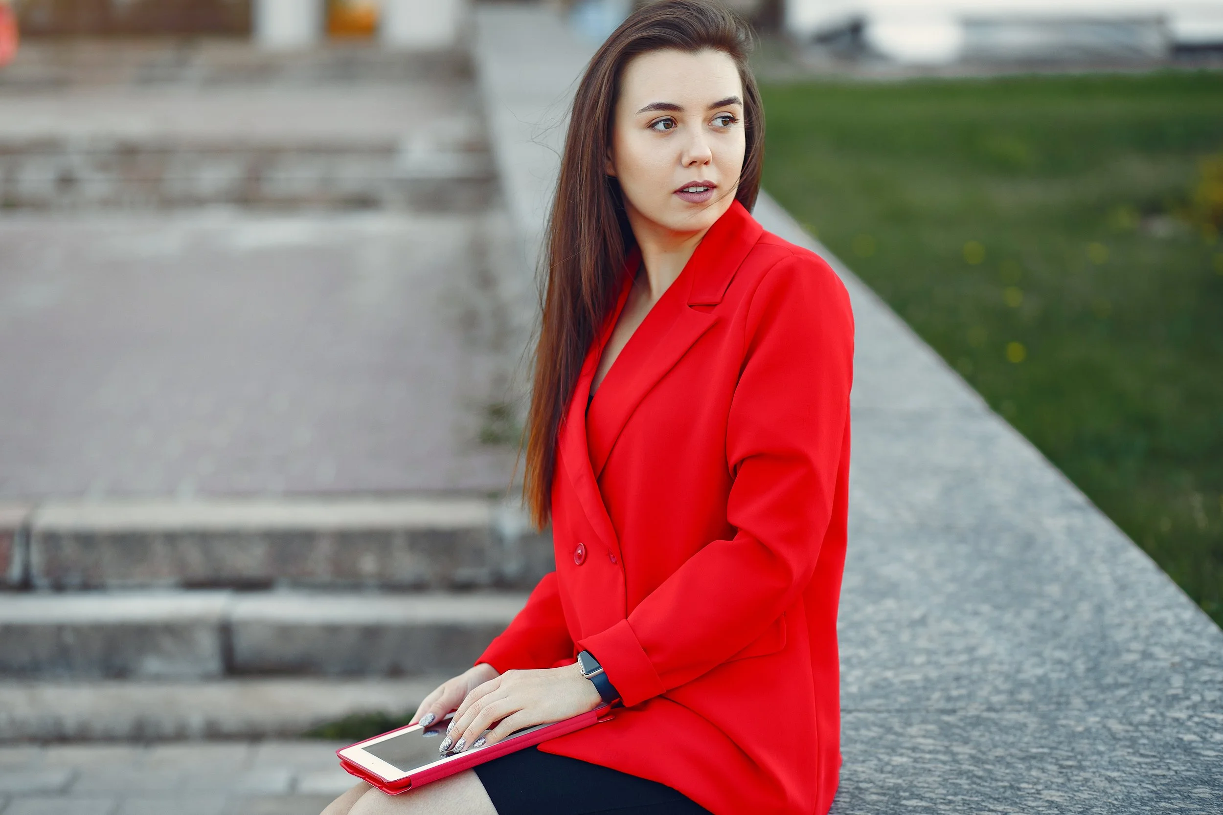 woman-red-jacket-using-tablet.jpg