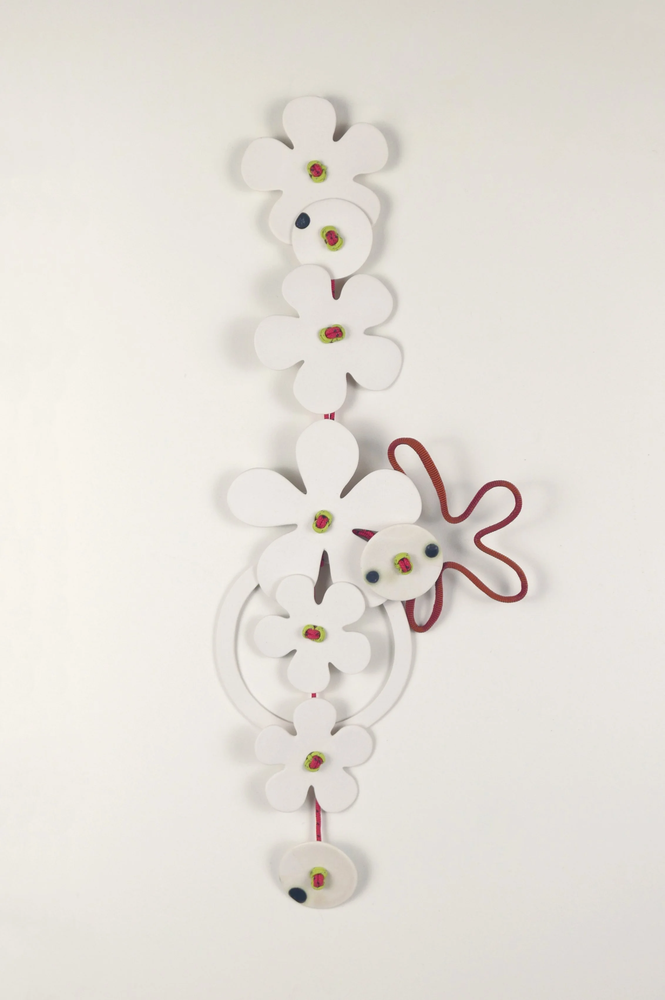 Flora 1. Porcelain, ceramic decals, acrylic, cord. View 3: 62cm H x 20cm W.