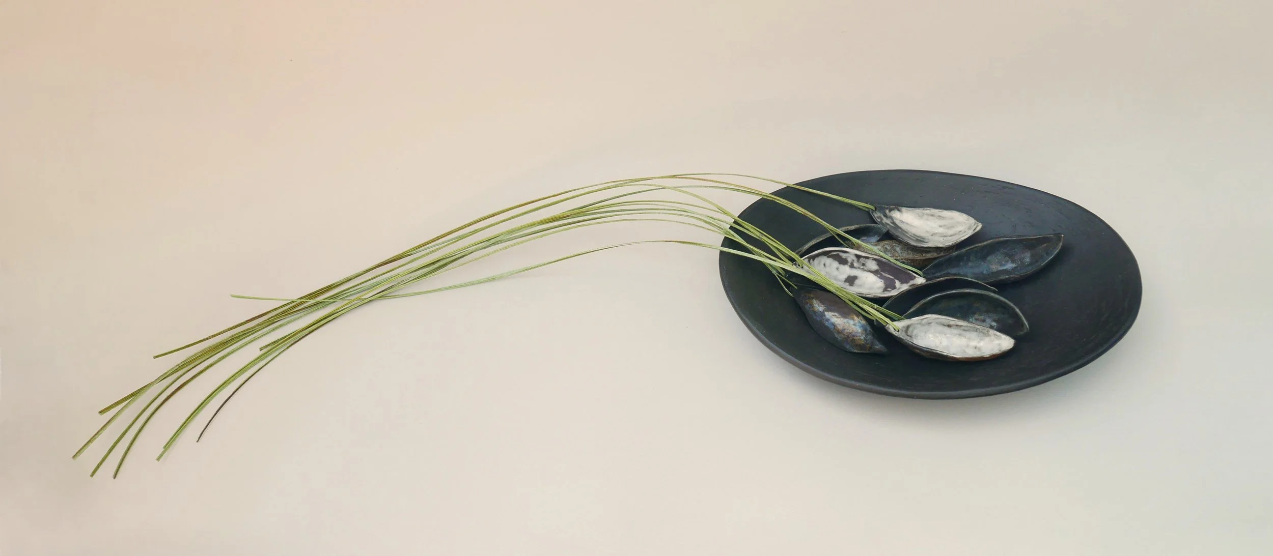 River Pods, Collected, detail. Stoneware, paper. 80cm L x 10cm H x 25cm D