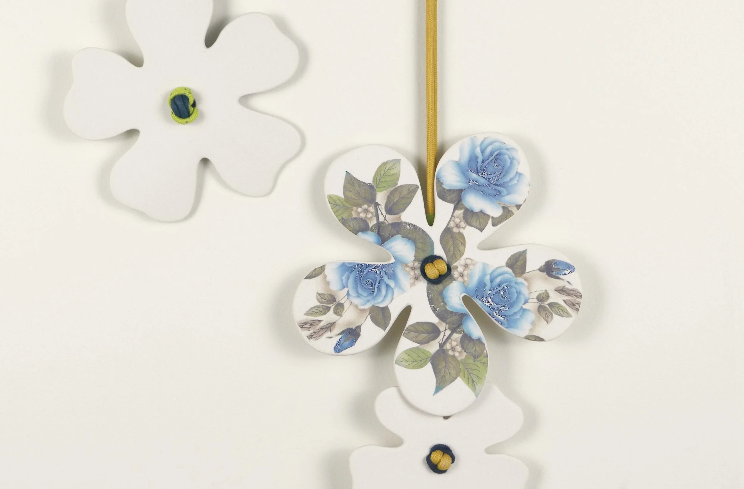 Flora 2, detail. Porcelain, ceramic decals, acrylic, cord. View 1: 66cm H x 23cm W.