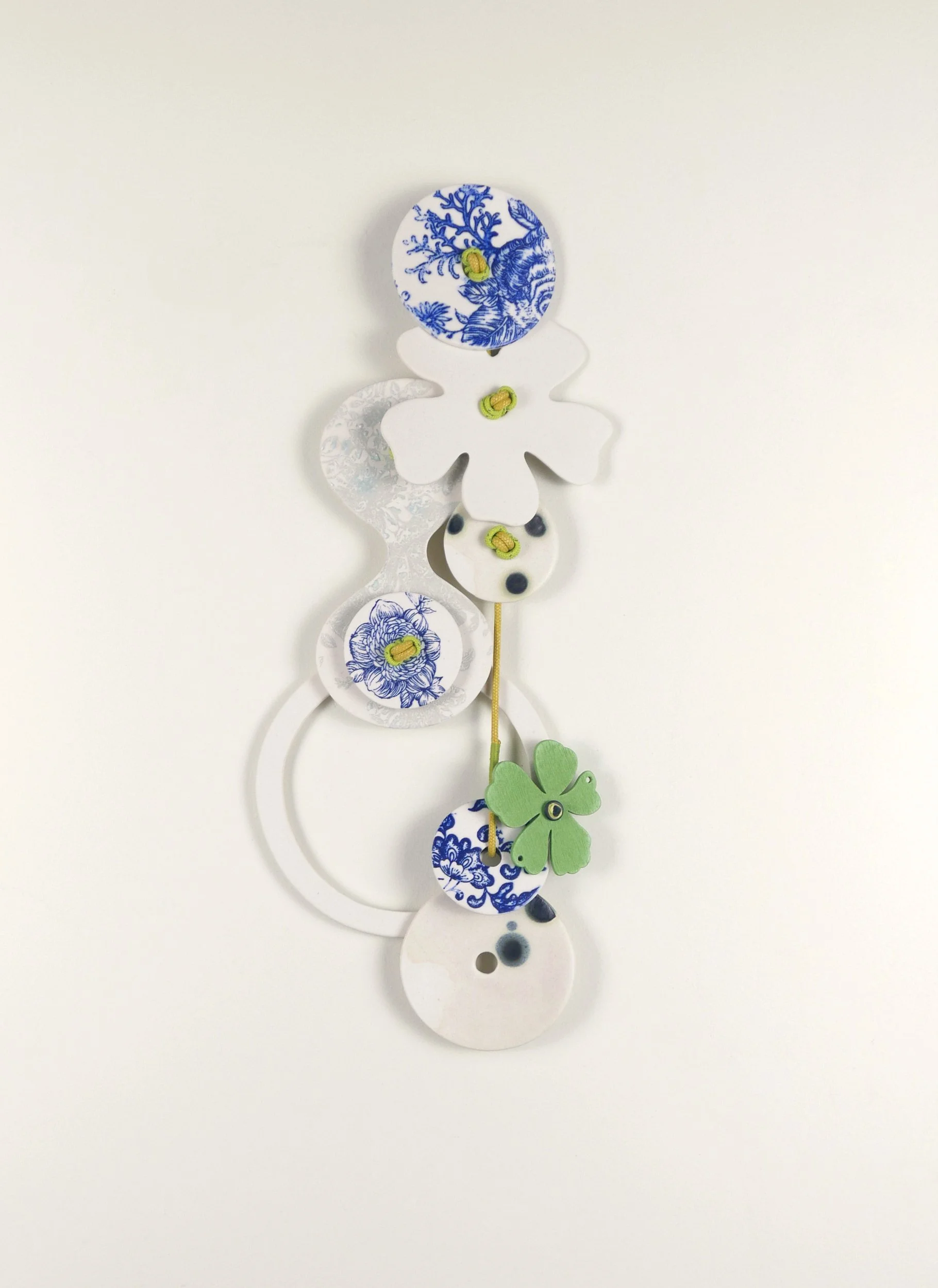 Flora 3. Porcelain, ceramic decals, acrylic, cord. View 3: 35cm H x 15cm W
