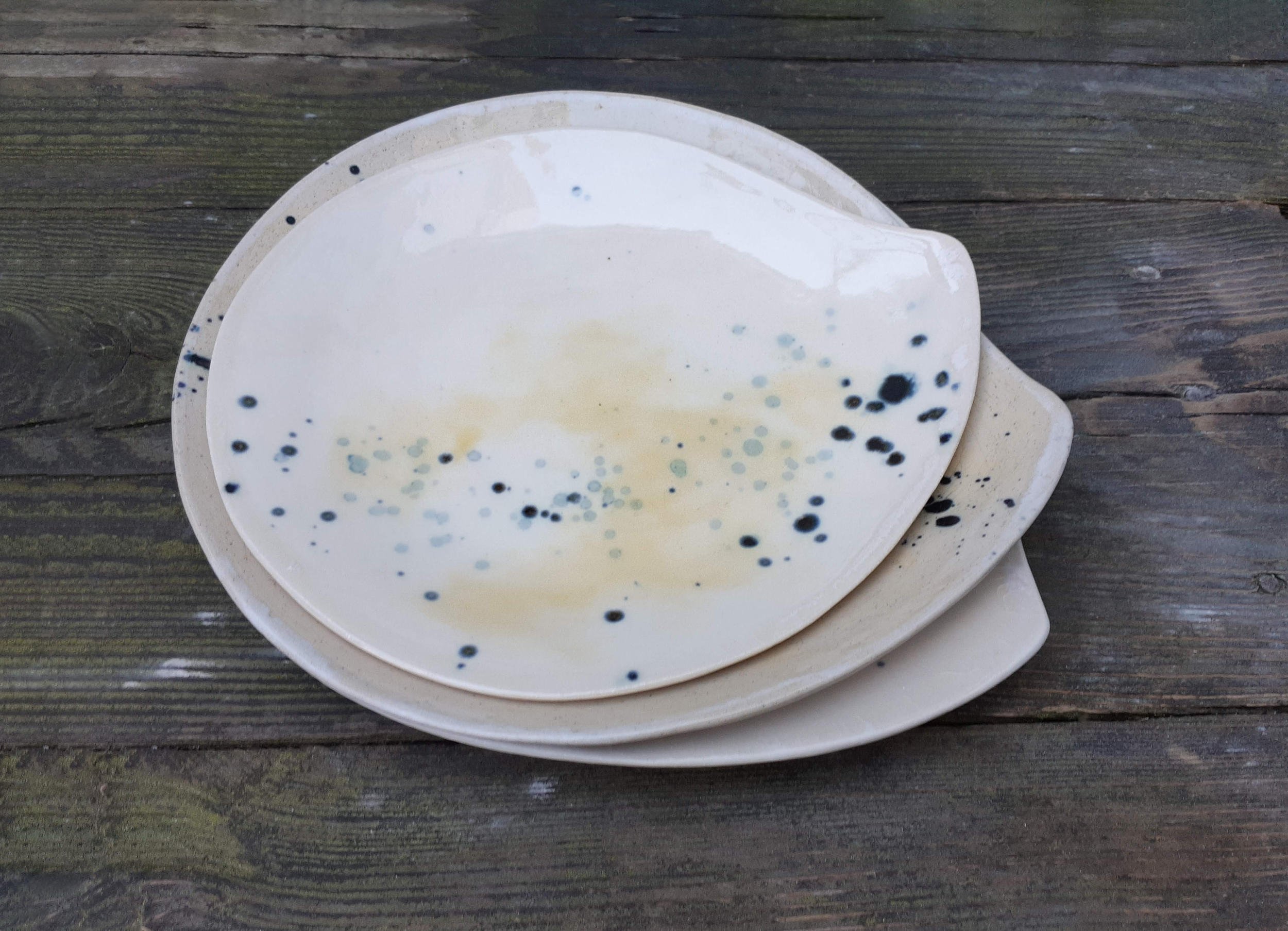 Stack of Plates. Porcelain and Stoneware. 26cm W x 5cm H x 24cm D.