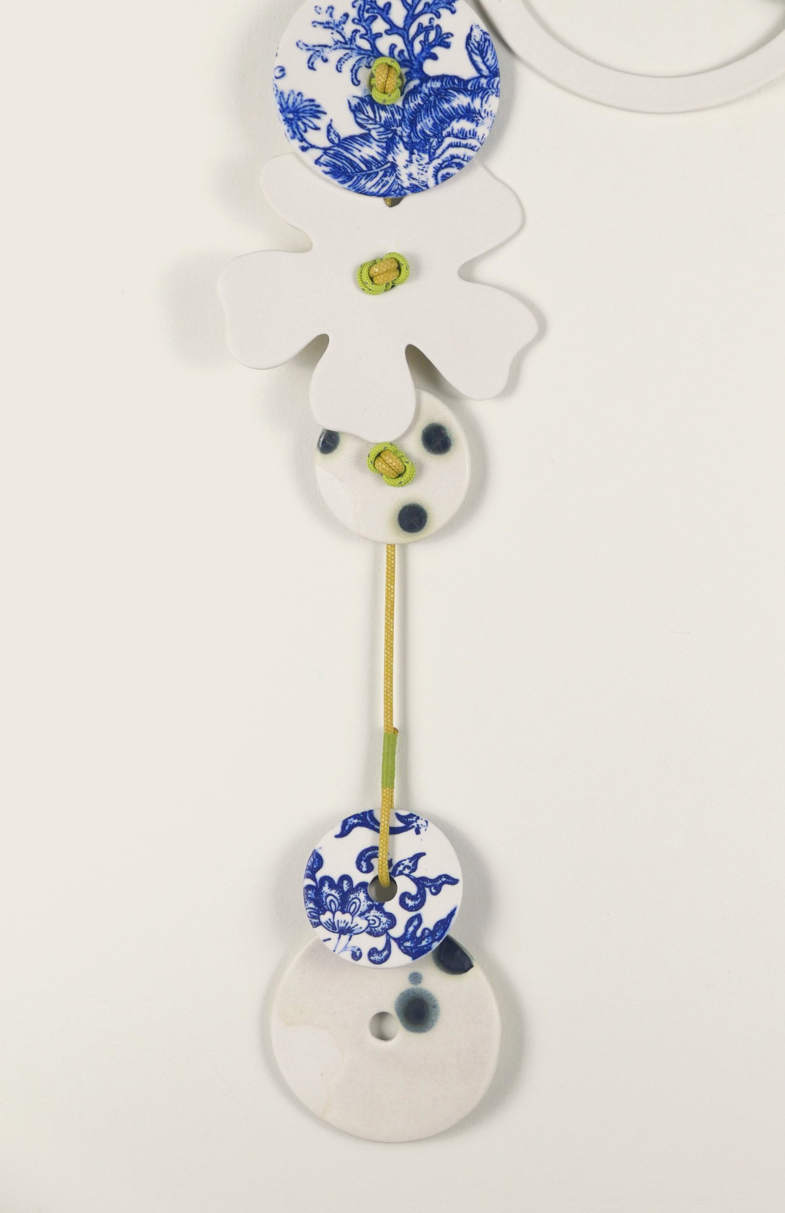 Flora 3. Porcelain, ceramic decals, acrylic, cord. View 1: 41cm H x 22cm W.
