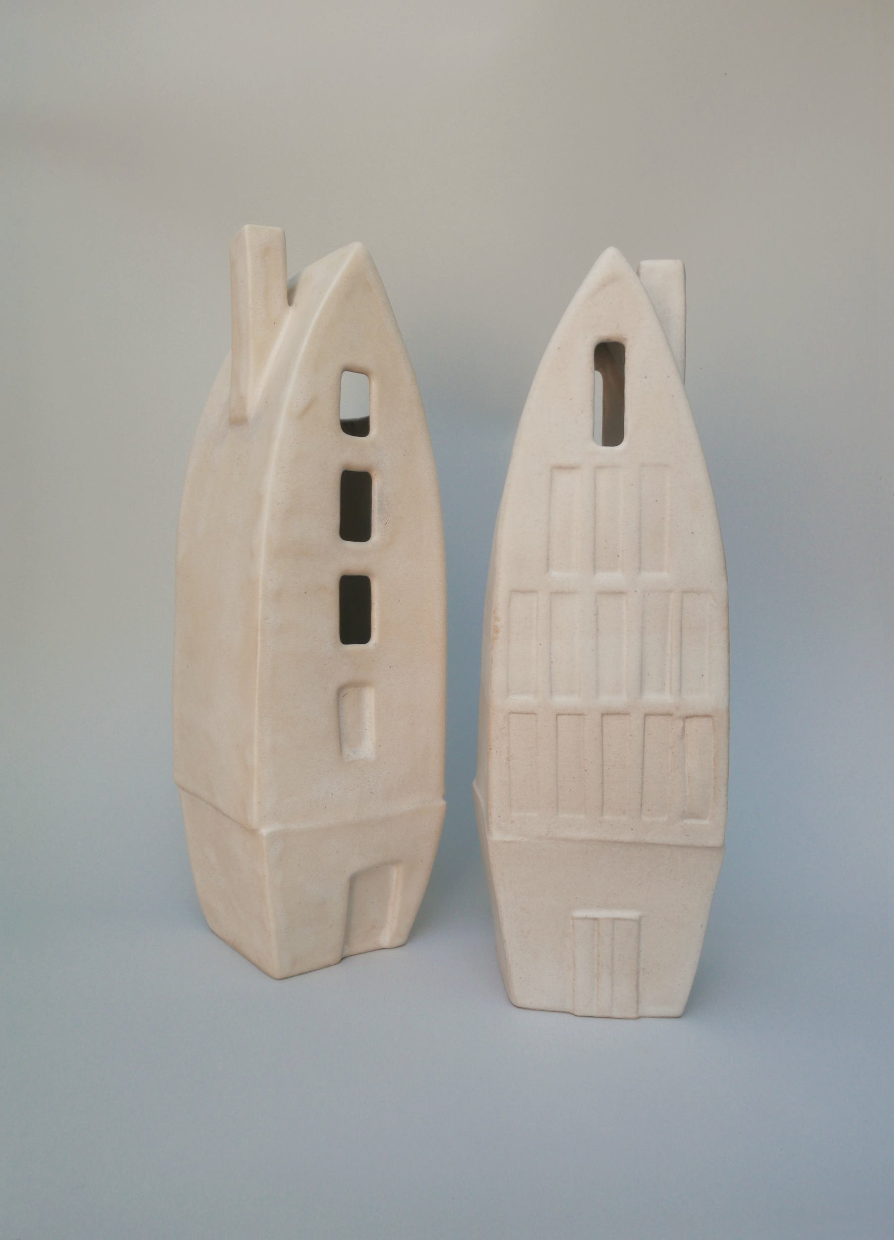 Canal Houses. Porcelain. Left: 9cm W x 30.5cm H x 9.5cm D, Right: 8.5cm W x 29cm H x 9cm D.