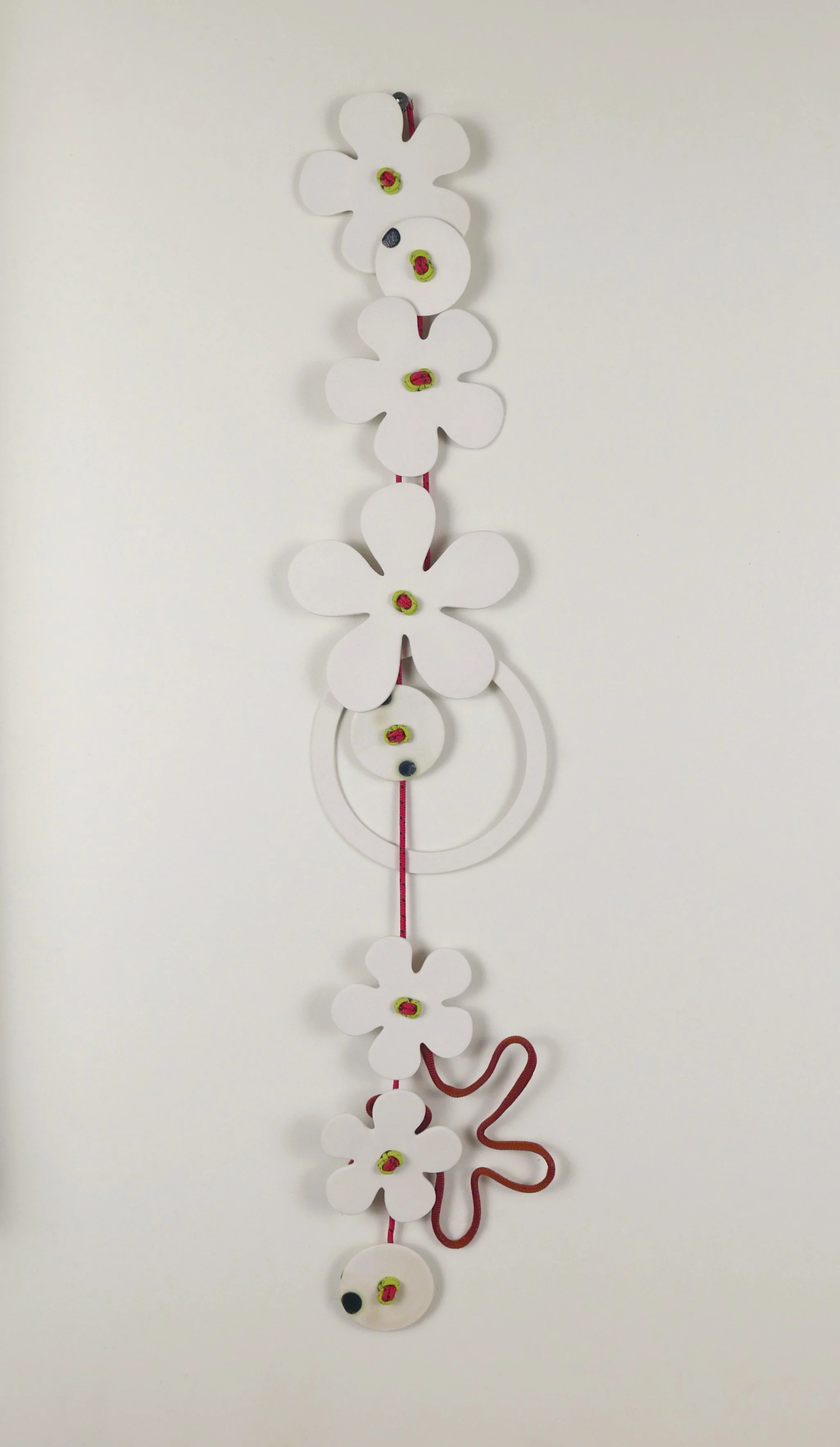 Flora 1. Porcelain, ceramic decals, acrylic, cord. View 2: 62cm H x 15cm W.