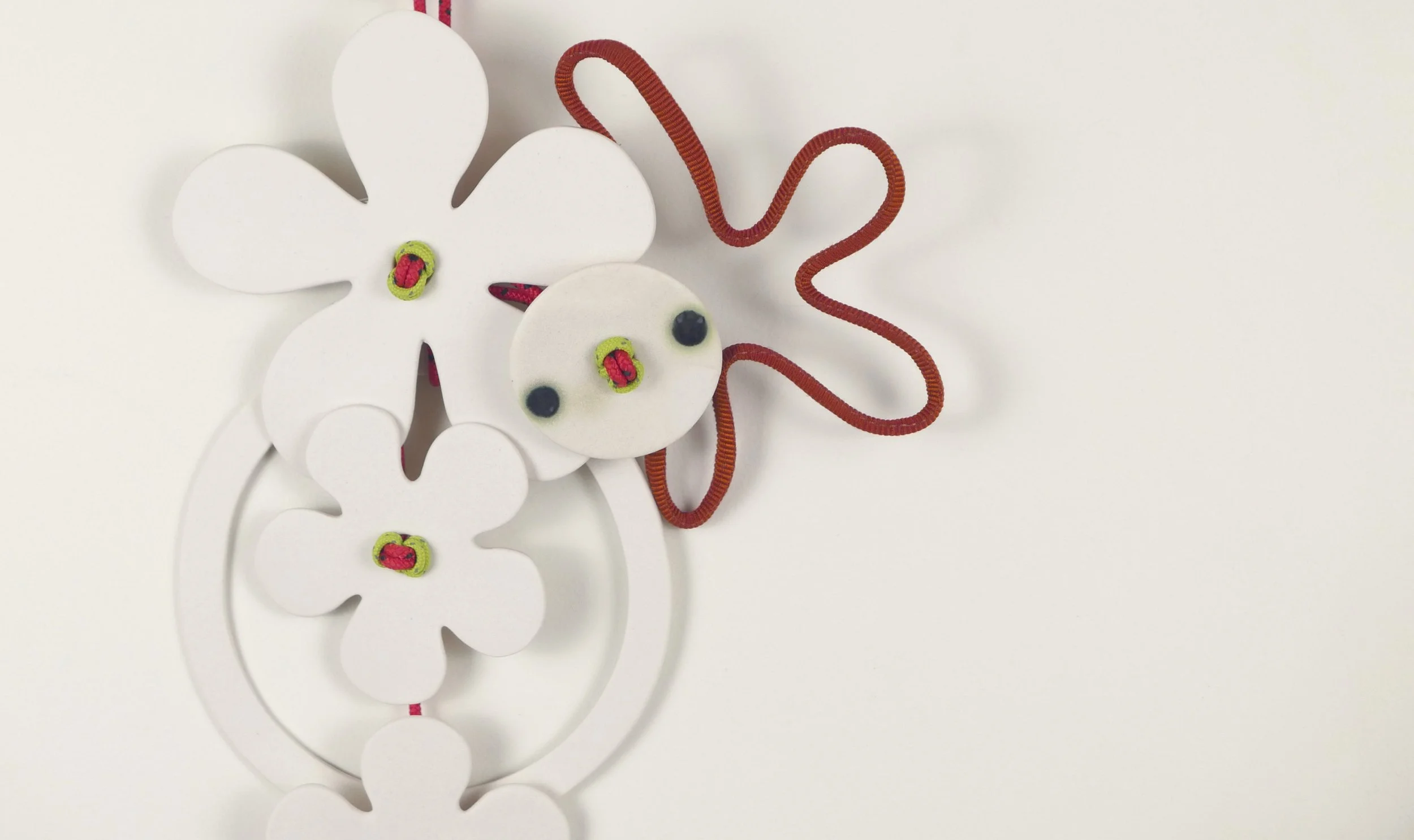 Flora 1, detail. Porcelain, ceramic decals, acrylic, cord. View 3: 62cm H x 20cm W.
