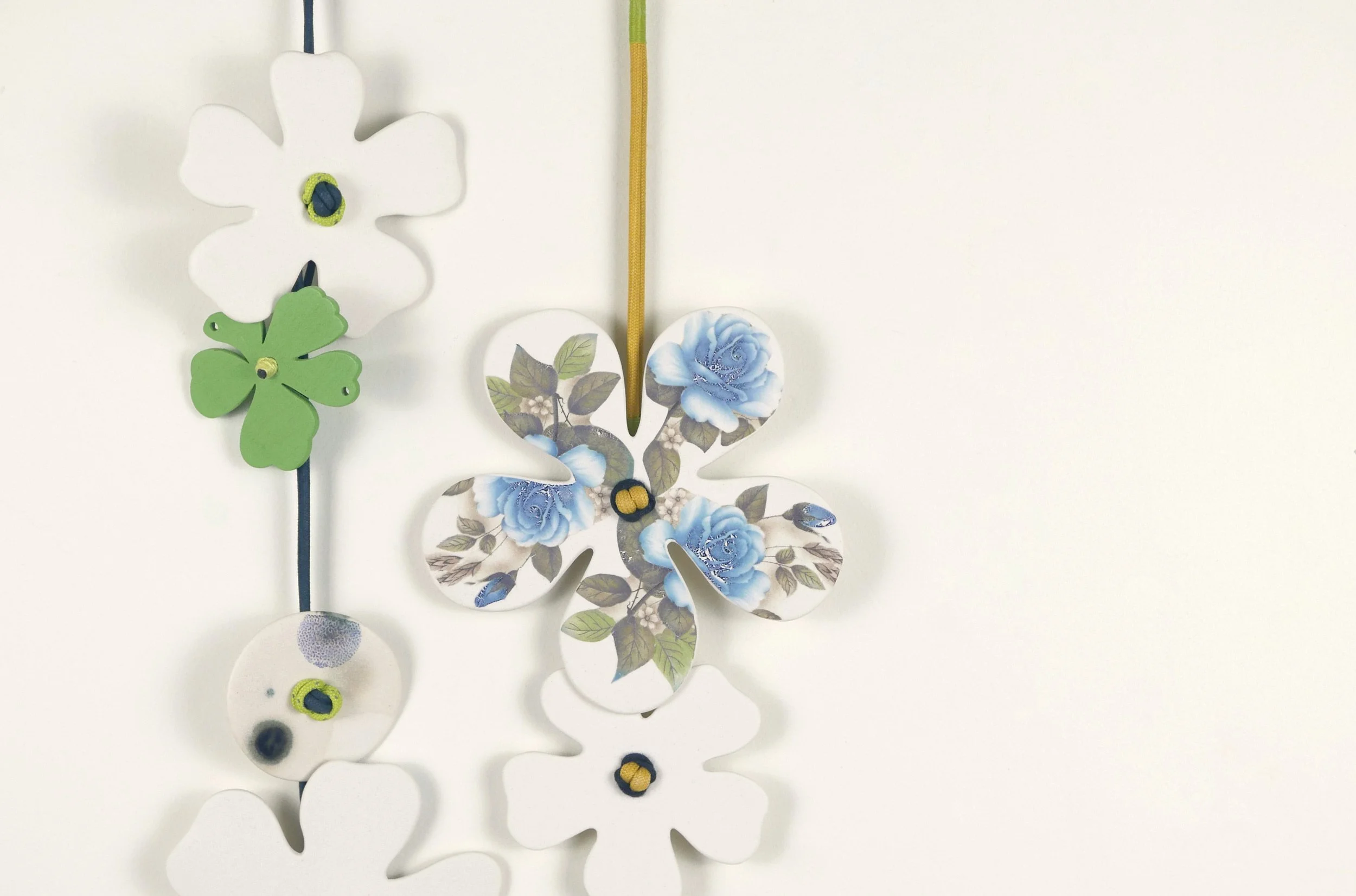 Flora 2, detail. Porcelain, ceramic decals, acrylic, cord. View 2: 57cm H x 20cm W.