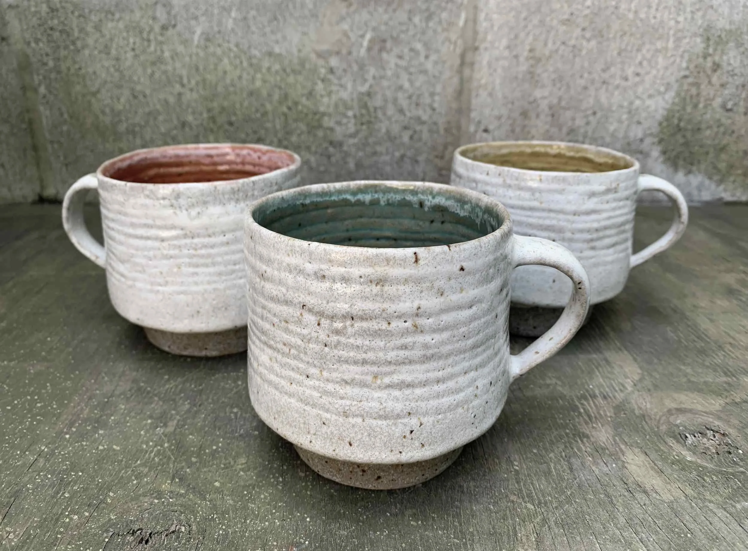 Coiled Mugs, Pink, Yellow and Blue. Stoneware. Approx. 13cm W x 9.5cm H x 10.5cm D.
