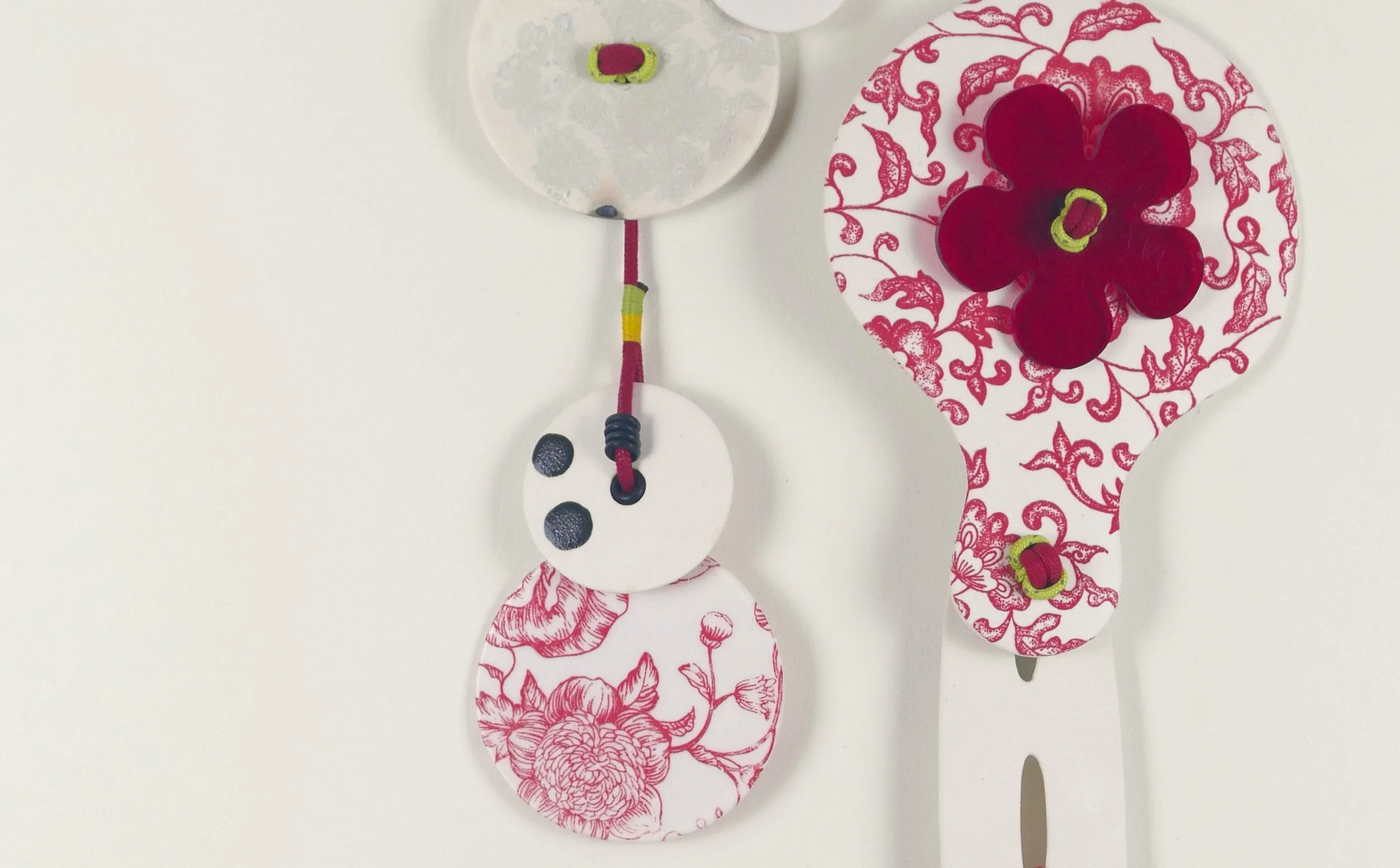 Flora 5. Porcelain, ceramic decals, acrylic, cord. View 2: 52cm H x 19cm W.
