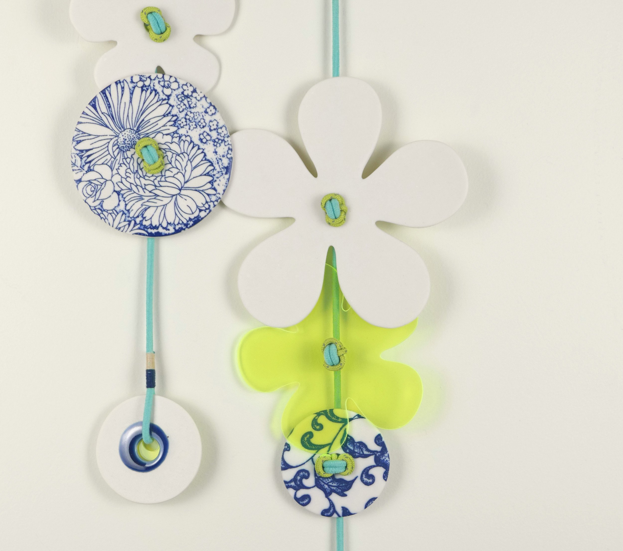 Flora 6. Porcelain, ceramic decals, acrylic, cord. View 1: 62cm H x 17cm W
