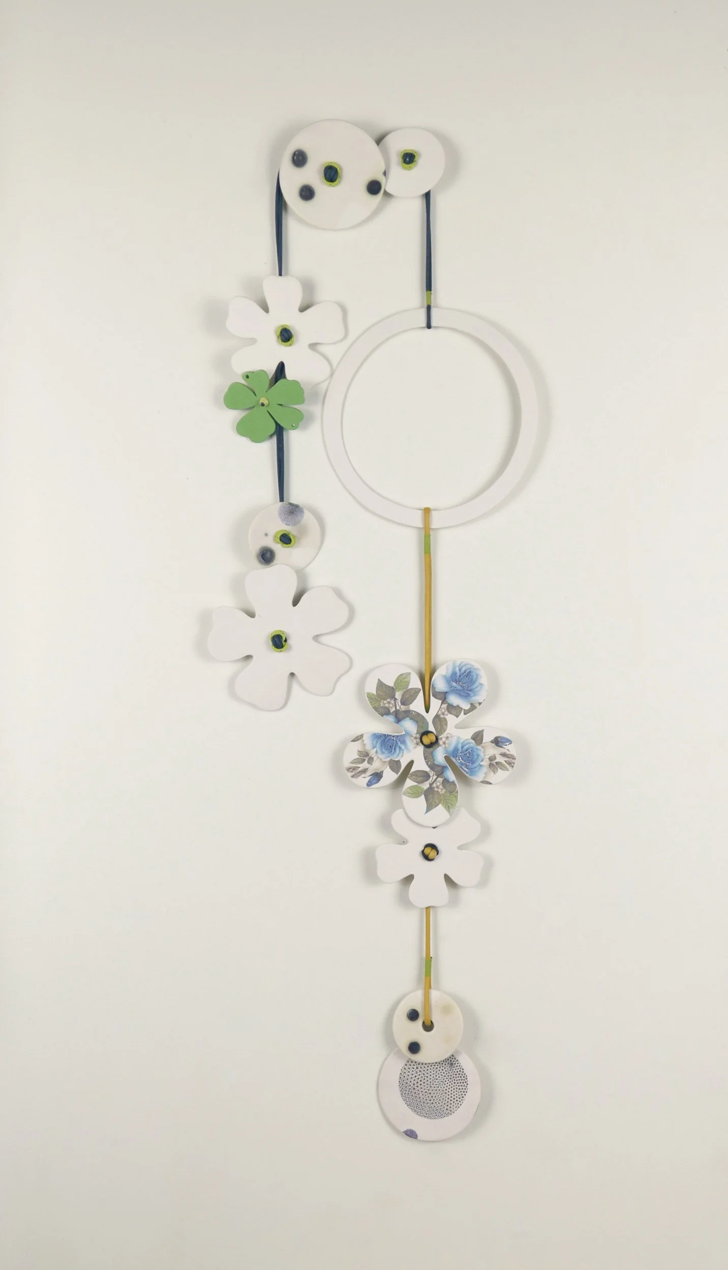 Flora 2. Porcelain, ceramic decals, acrylic, cord. View 1: 66cm H x 23cm W.
