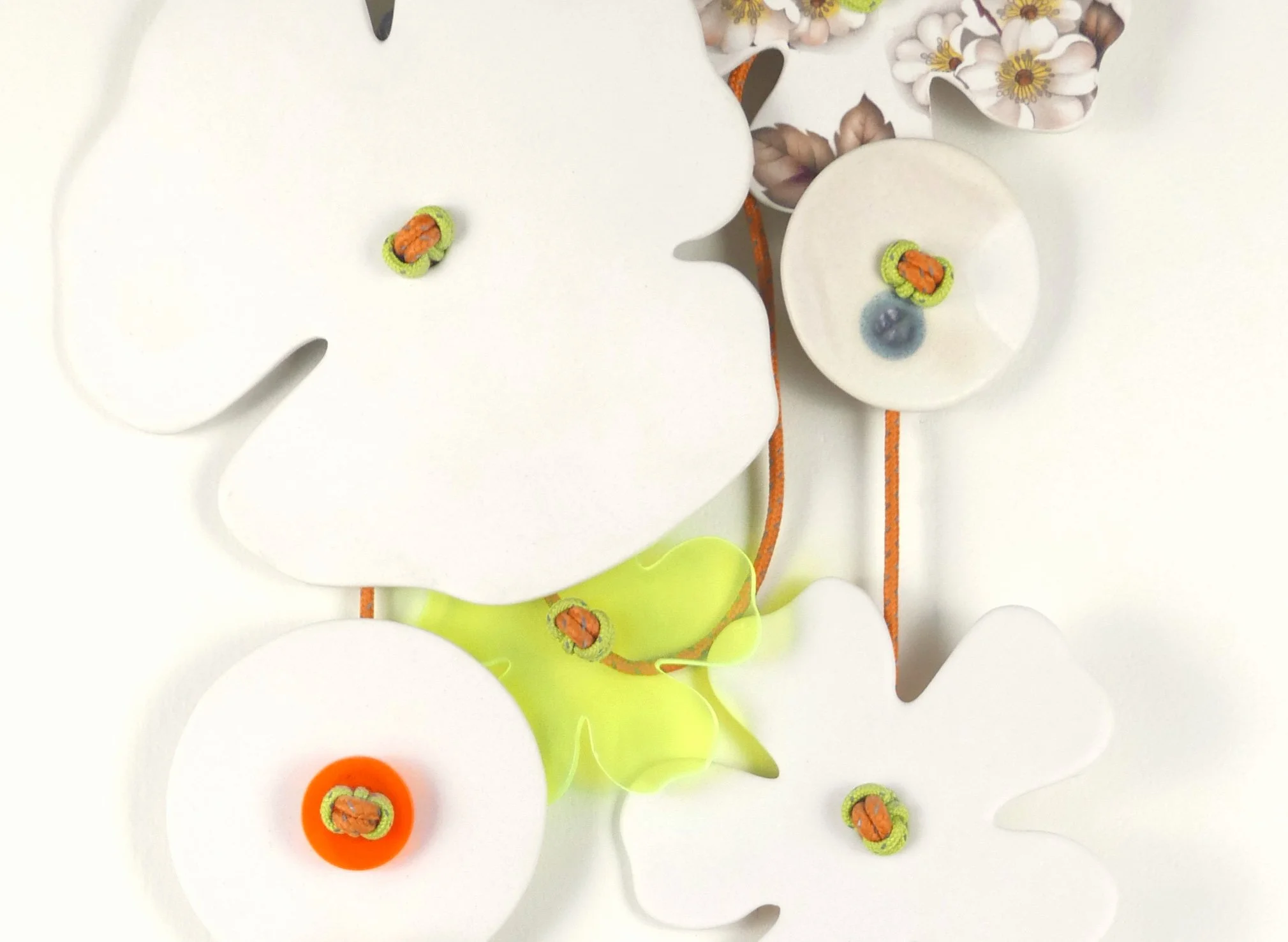 Flora 8. Porcelain, ceramic decals, acrylic, cord. View 2: 43.5cm H x 19cm W.