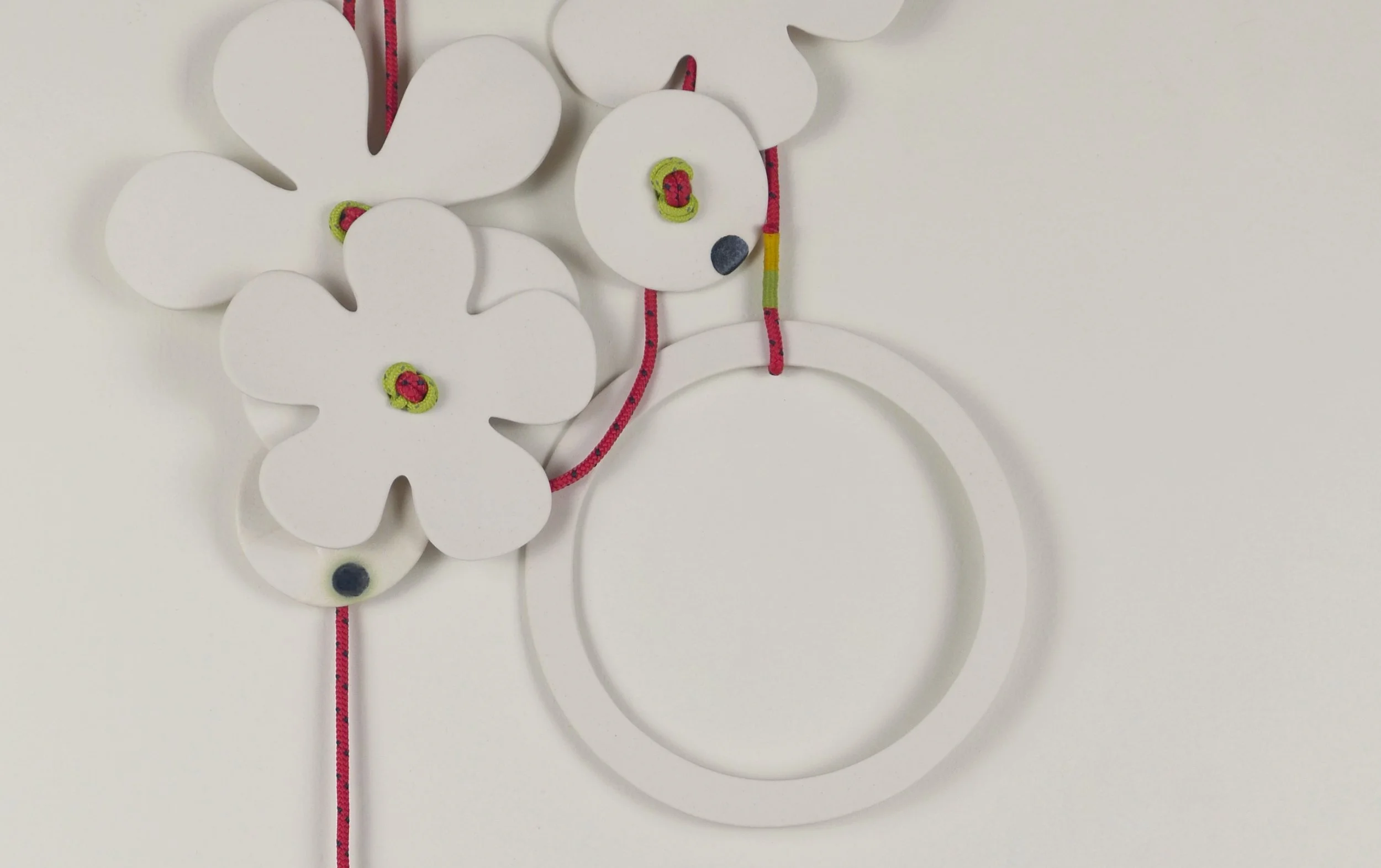 Flora 1, detail. Porcelain, ceramic decals, acrylic, cord. View 1: 47cm H x 21cm W.