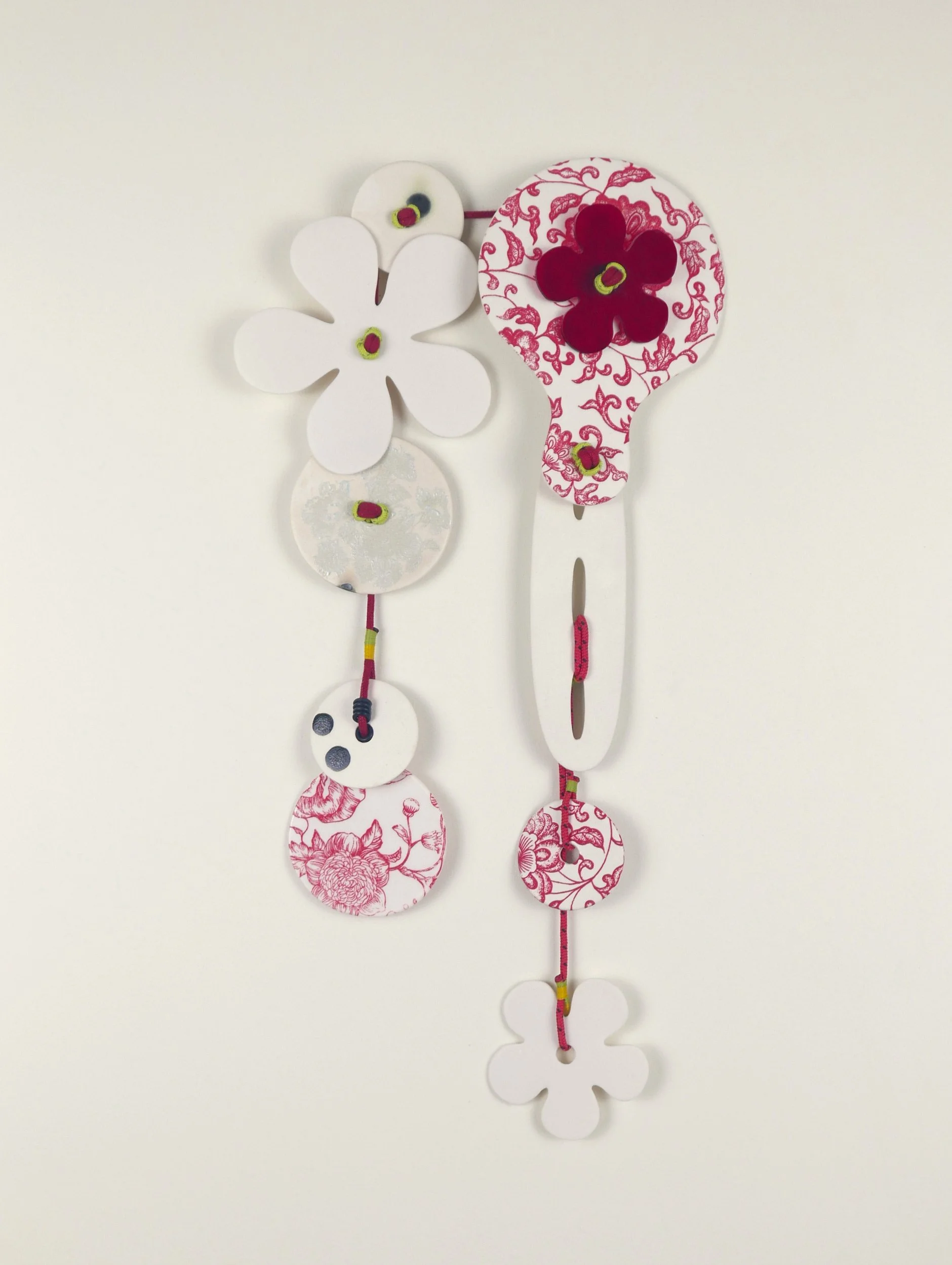 Flora 5. Porcelain, ceramic decals, acrylic, cord. View 1: 43cm H x 21cm W.
