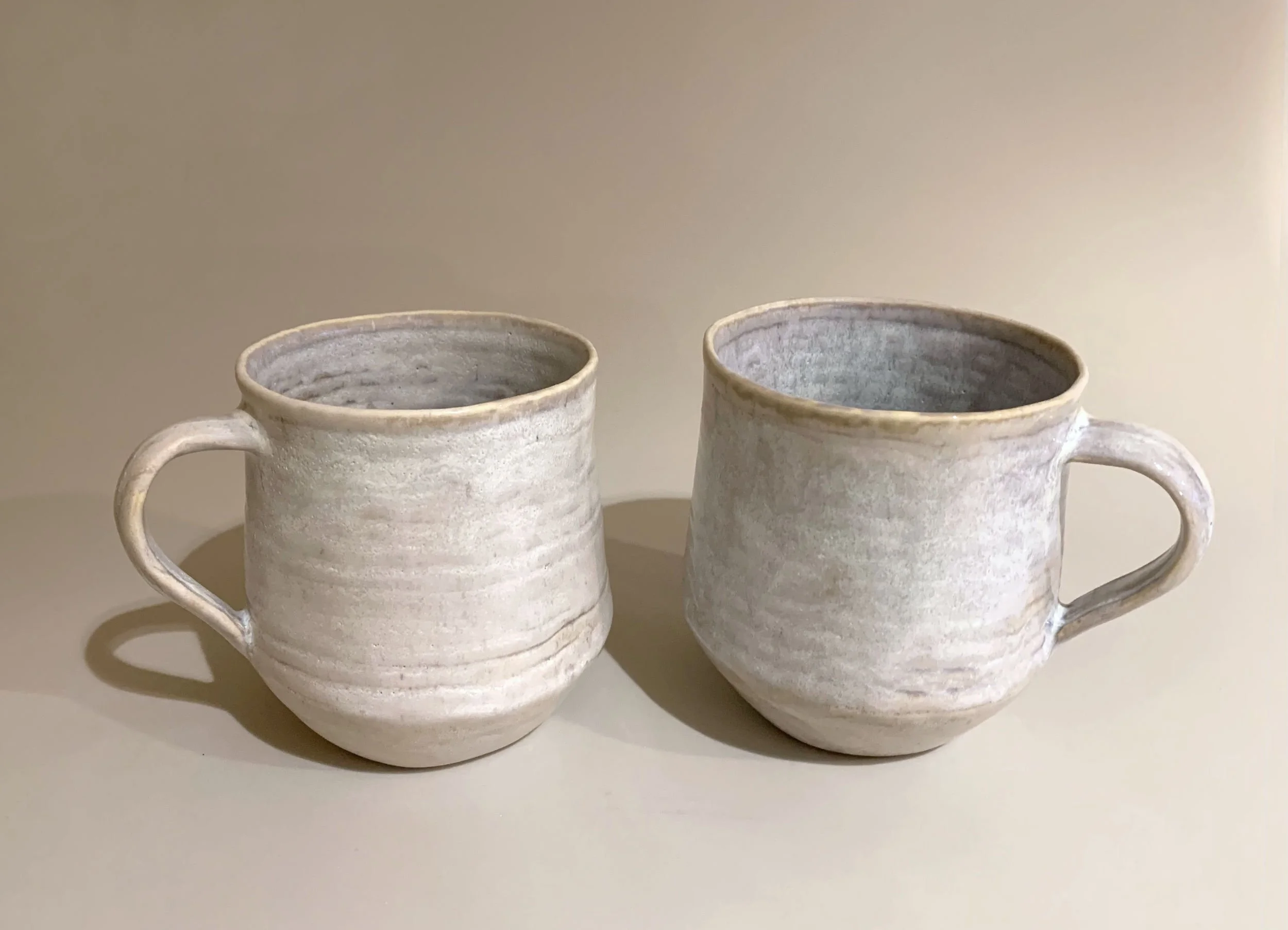 Coiled Mugs, Blue Ice. Porcelain. Dimensions each: 13 W x 9.5cm H x 9.5cm D.