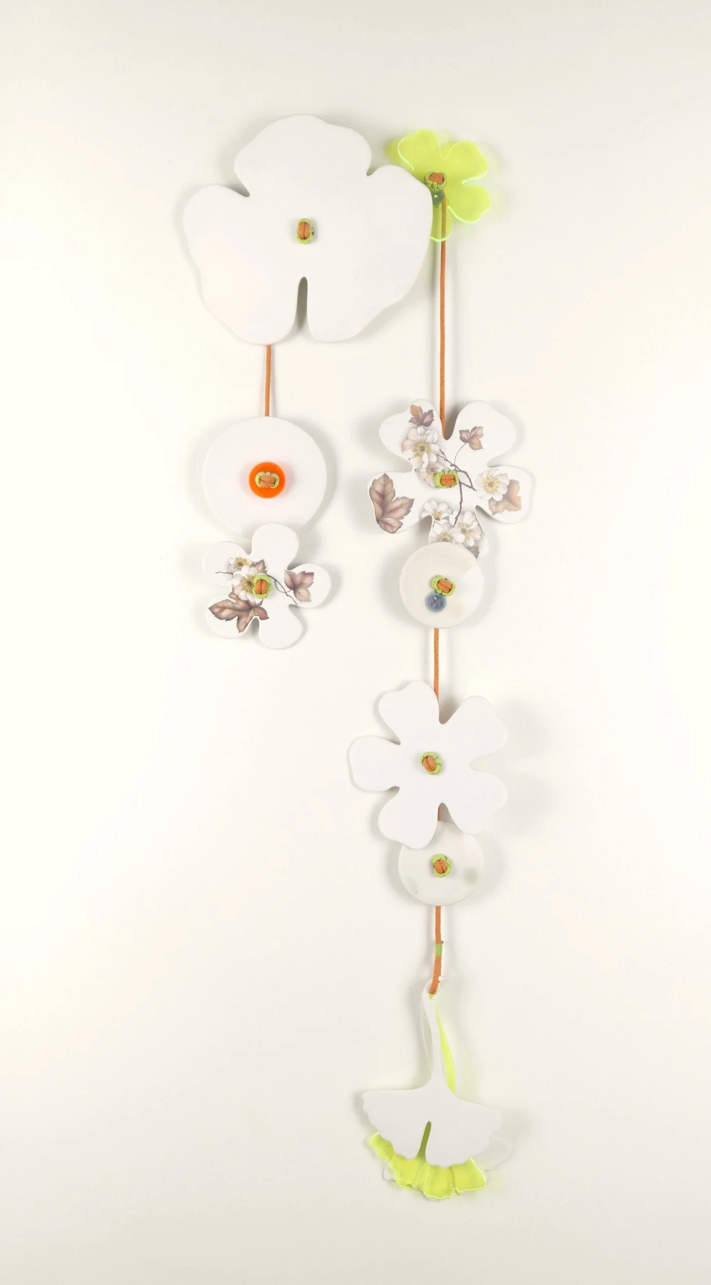 Flora 8. Porcelain, ceramic decals, acrylic, cord. View 1: 60.5cm H x 19cm W.