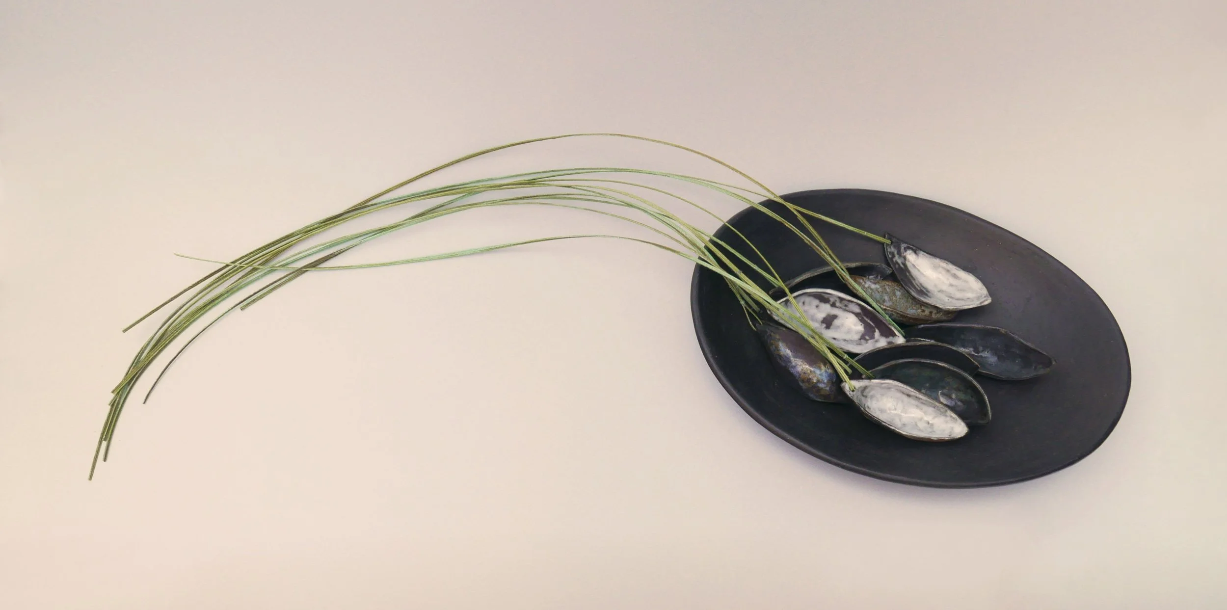 River Pods, Collected, detail. Stoneware, paper. 80cm L x 10cm H x 25cm D
