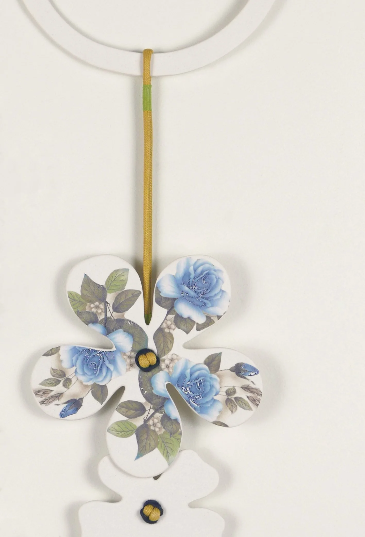 Flora 2, detail. Porcelain, ceramic decals, acrylic, cord. View 2: 57cm H x 20cm W.