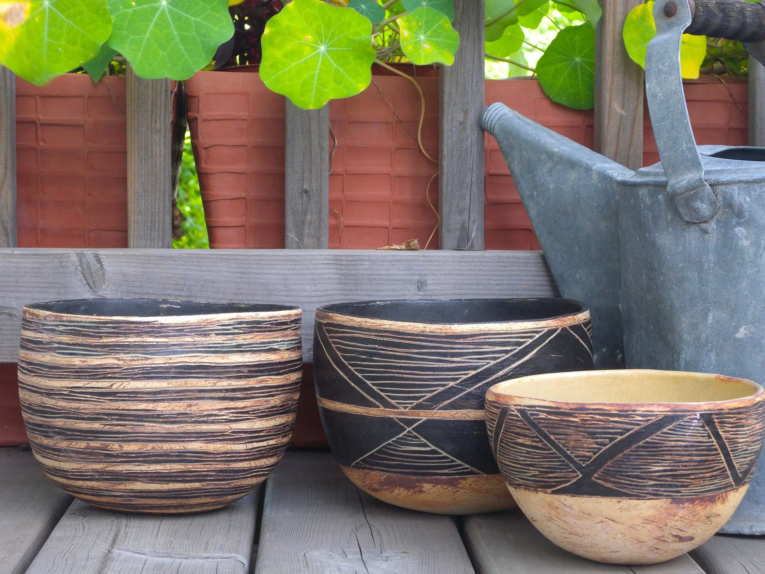 Ensemble. Stoneware, black slips.