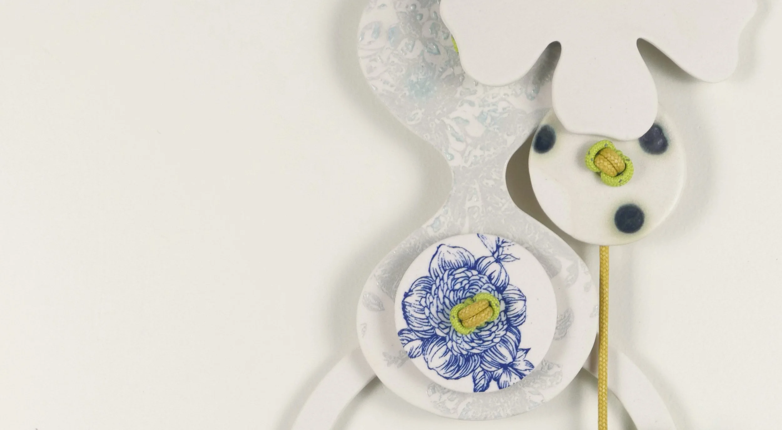 Flora 3. Porcelain, ceramic decals, acrylic, cord. View 3: 35cm H x 15cm W