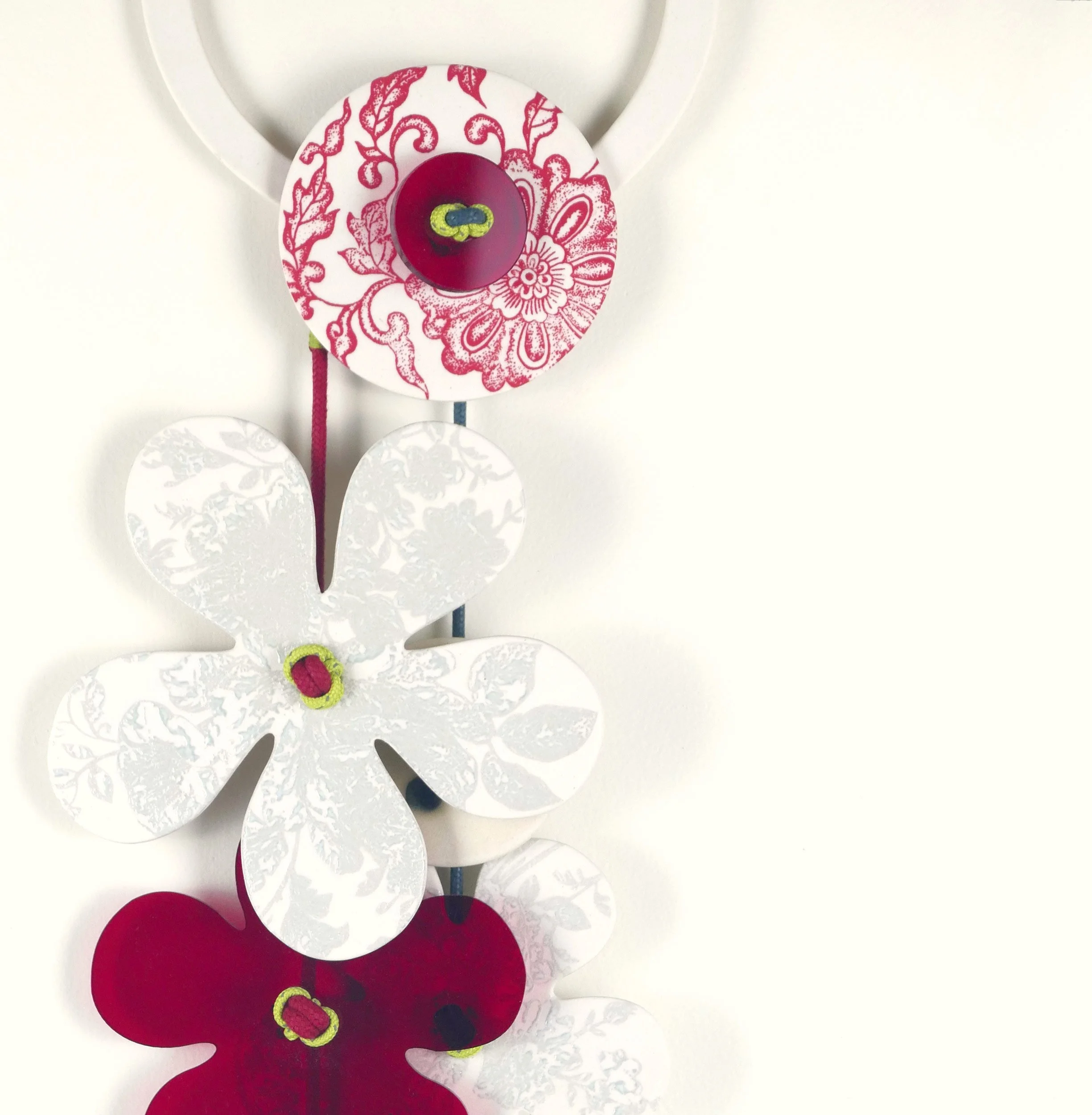Flora 7. Porcelain, ceramic decals, acrylic, cord. View 2: 65cm H x 14cm W.