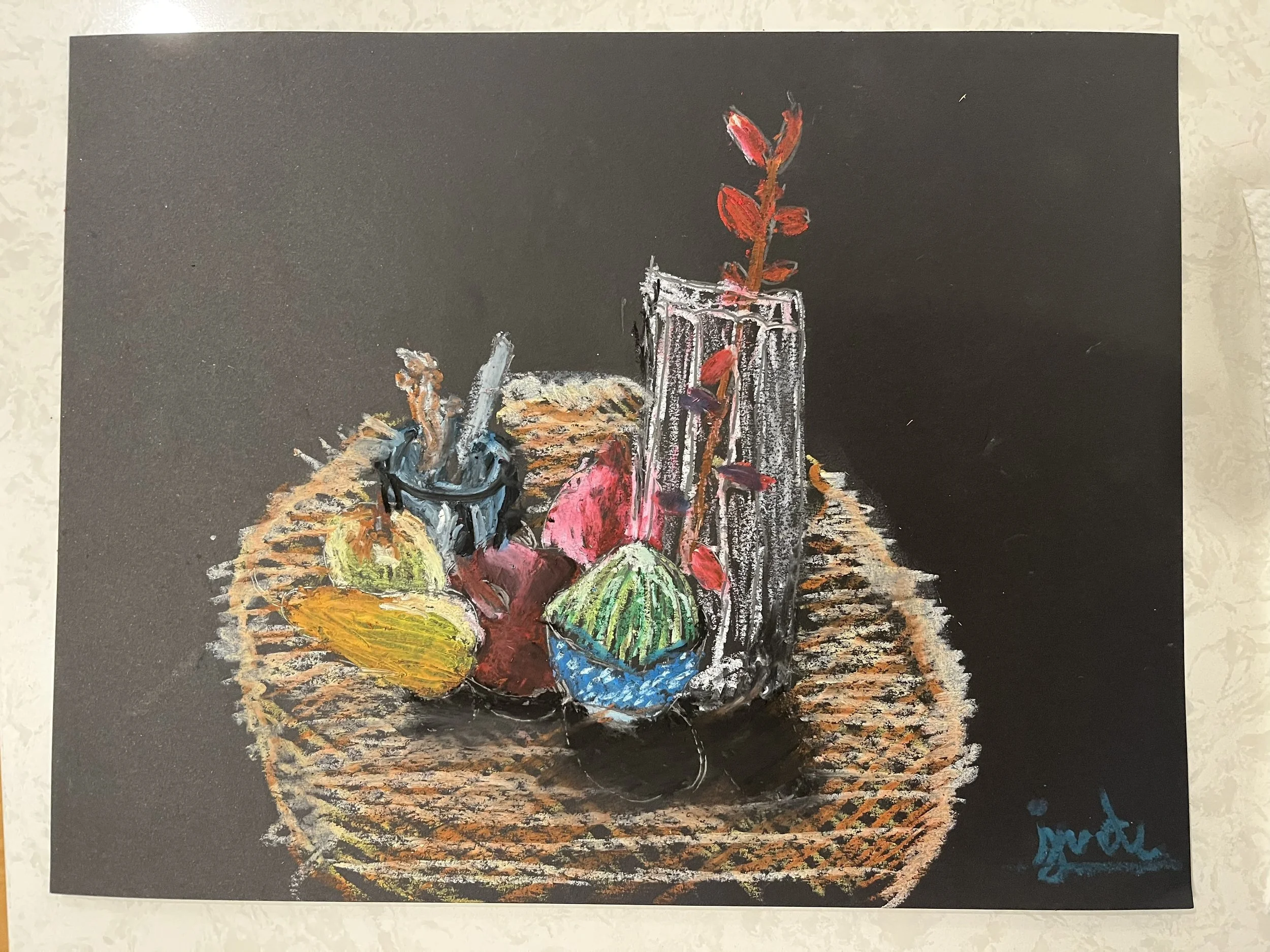 Colorful still life drawing of a glass vase with a branch, various fruits on a woven surface, and a blue object, on a dark background.