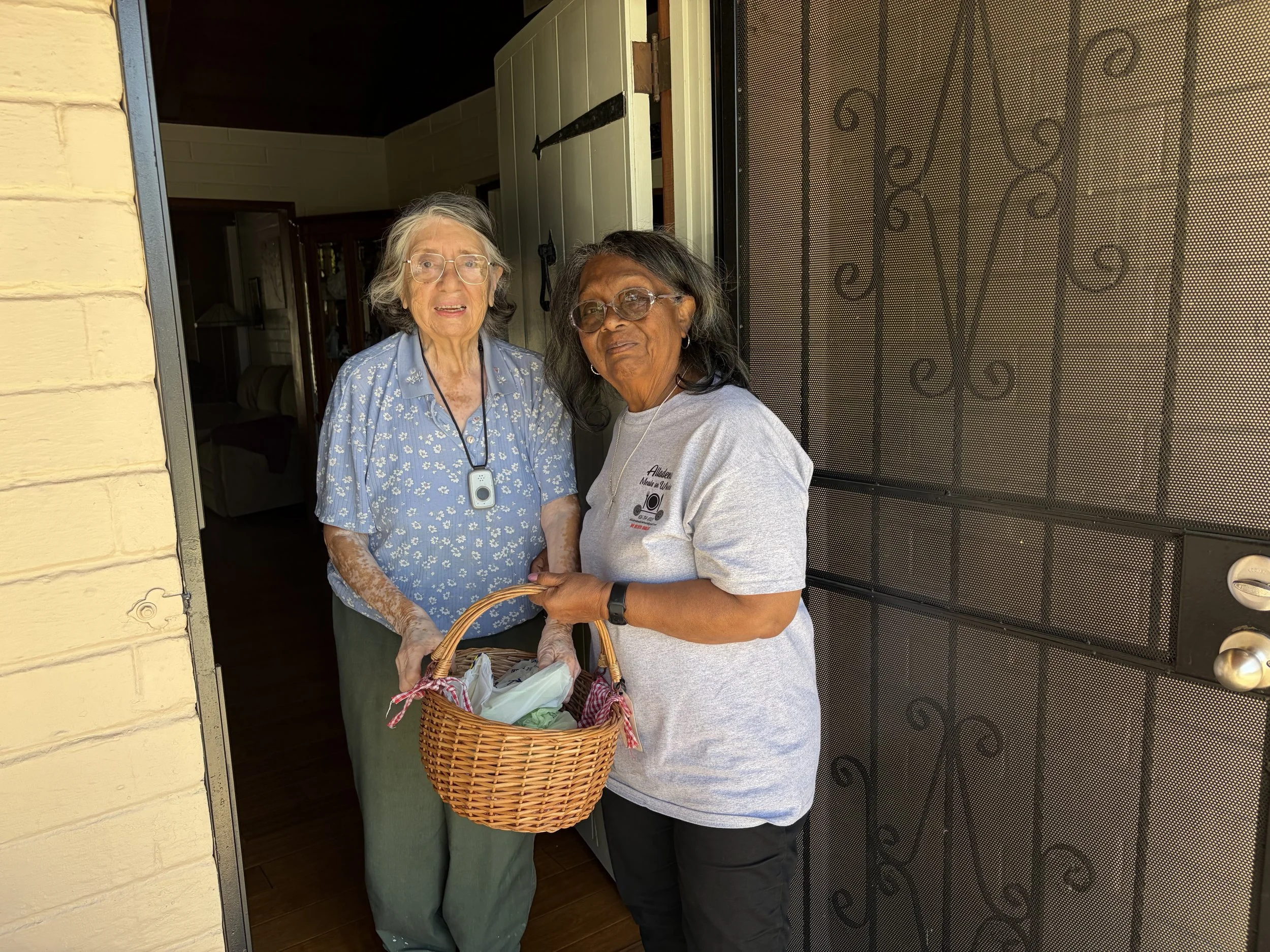 Volunteer Delivering Hot Meal to Altadena Resident
