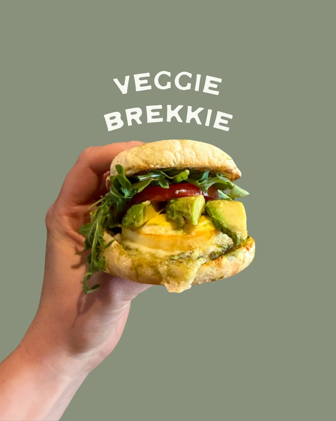 VEGGIE BREKKIE SANDWICH 🌿⁠
⁠
Pesto, egg, avocado, tomato, Swiss cheese &amp; arugula, all stacked on a toasted English muffin.⁠
⁠
Fresh, filling, and the perfect way to start your day ☀️
