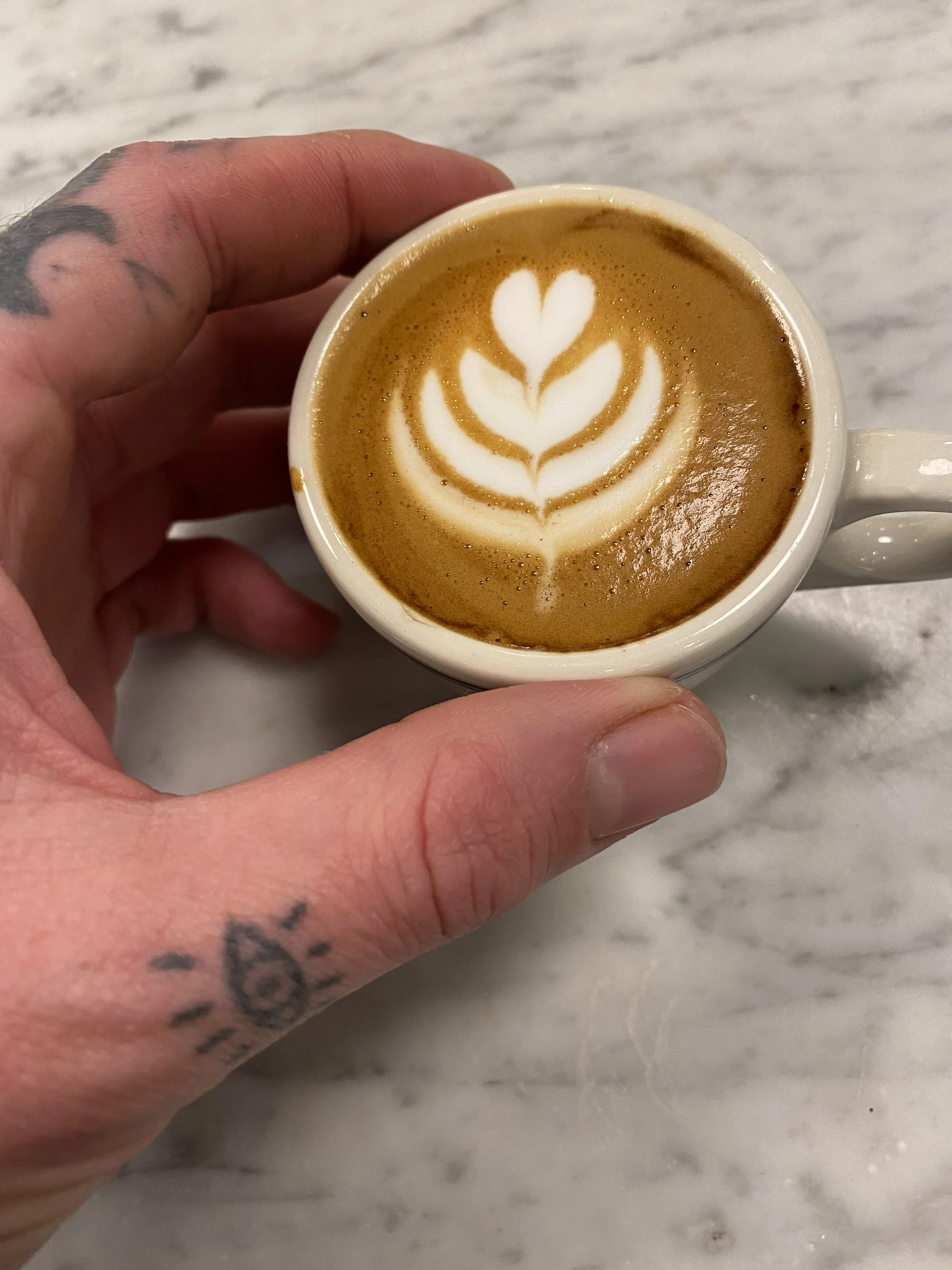 Double macchiato with latte art prepared by Daniel Karl Nennig.