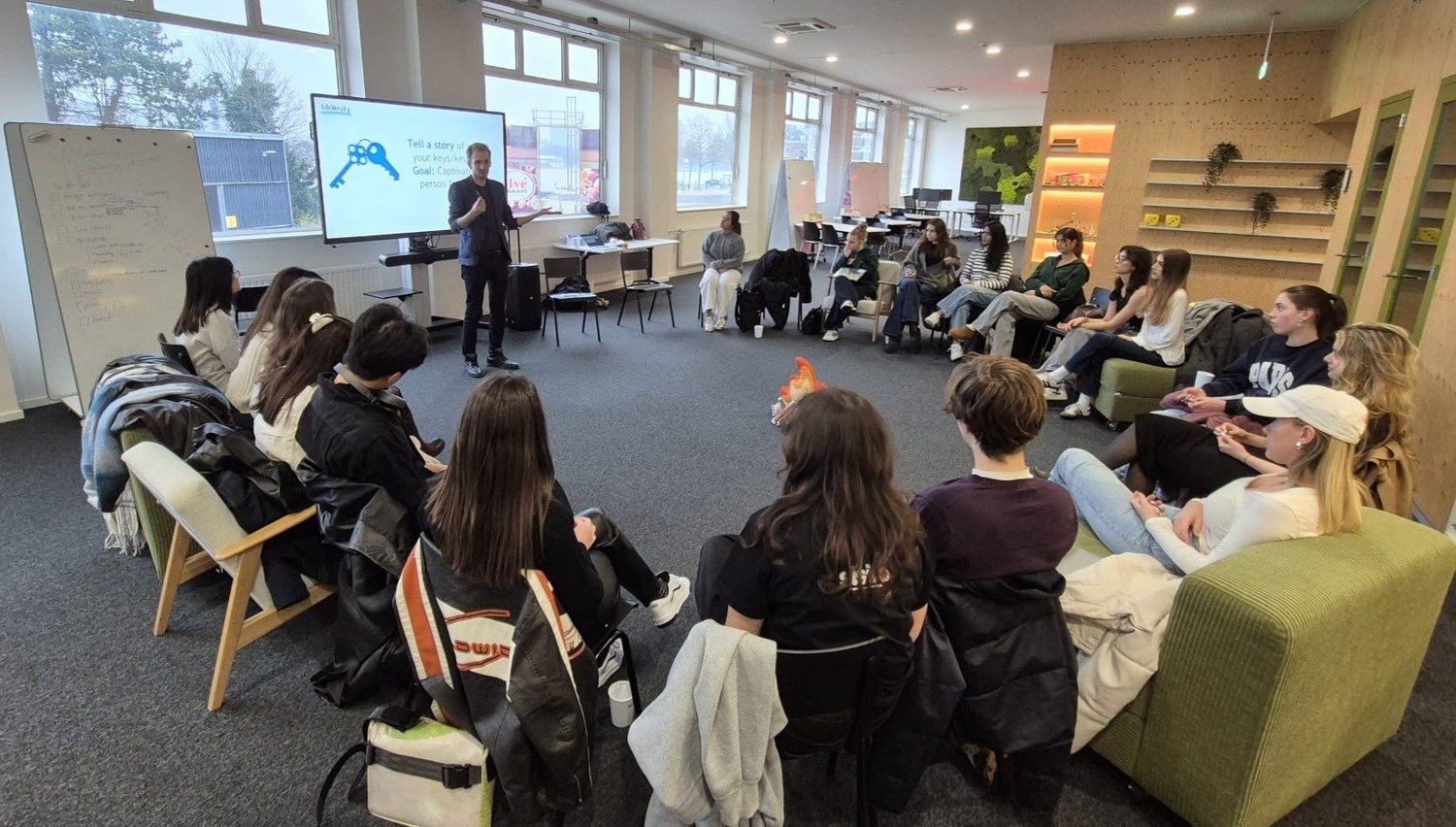 Participants seated in a circle during a storytelling workshop