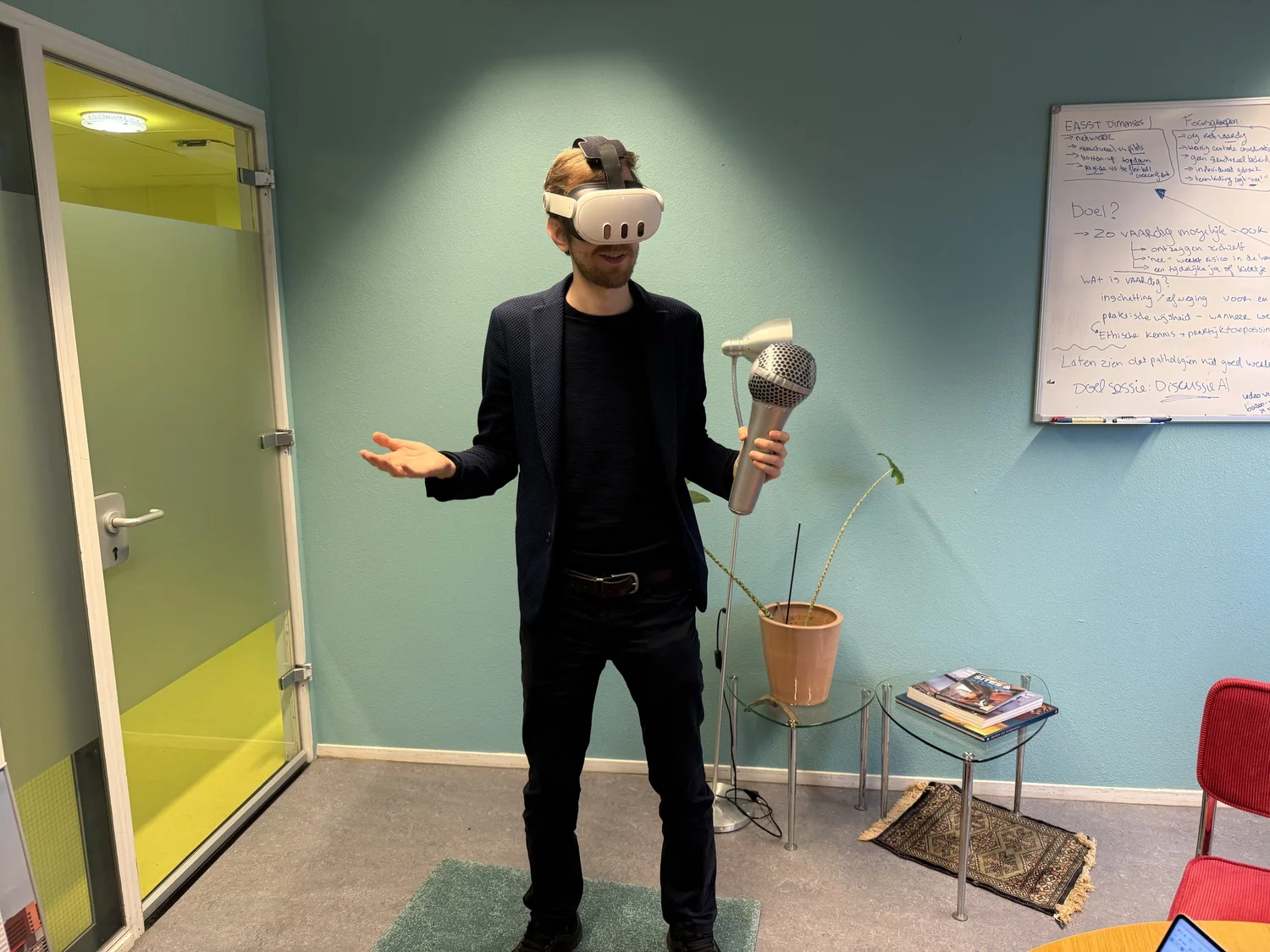 A participant practising a talk in a VR headset during 1:1 coaching