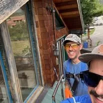 Partridge Property Maintenance LLC team members at a local exterior project site.