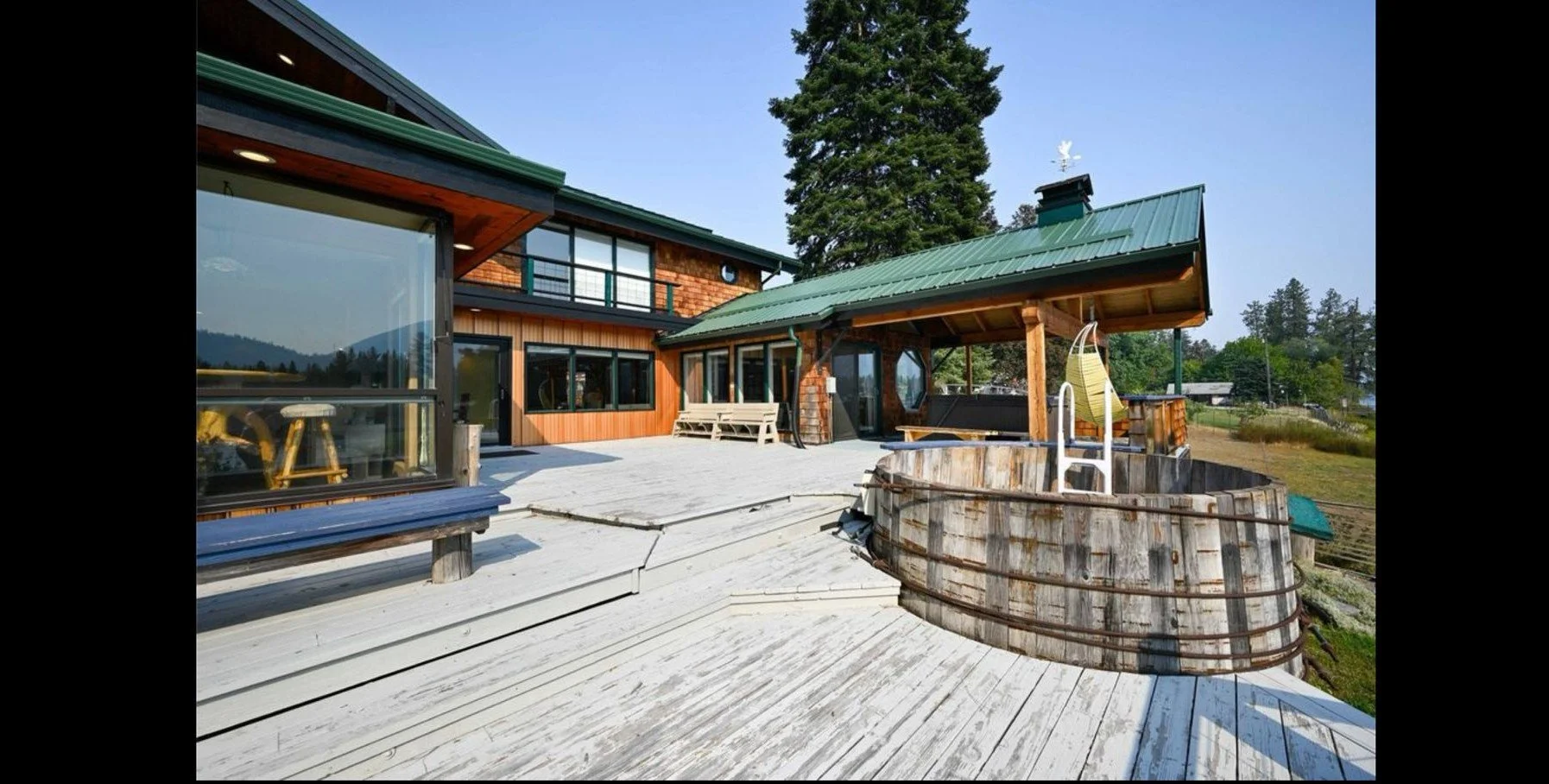Custom home deck and outdoor living space built by Partridge Property Maintenance in Western Montana