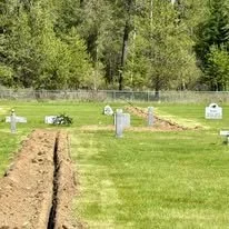 Sprinkler installation and trenching work completed as part of property maintenance and site improvements.