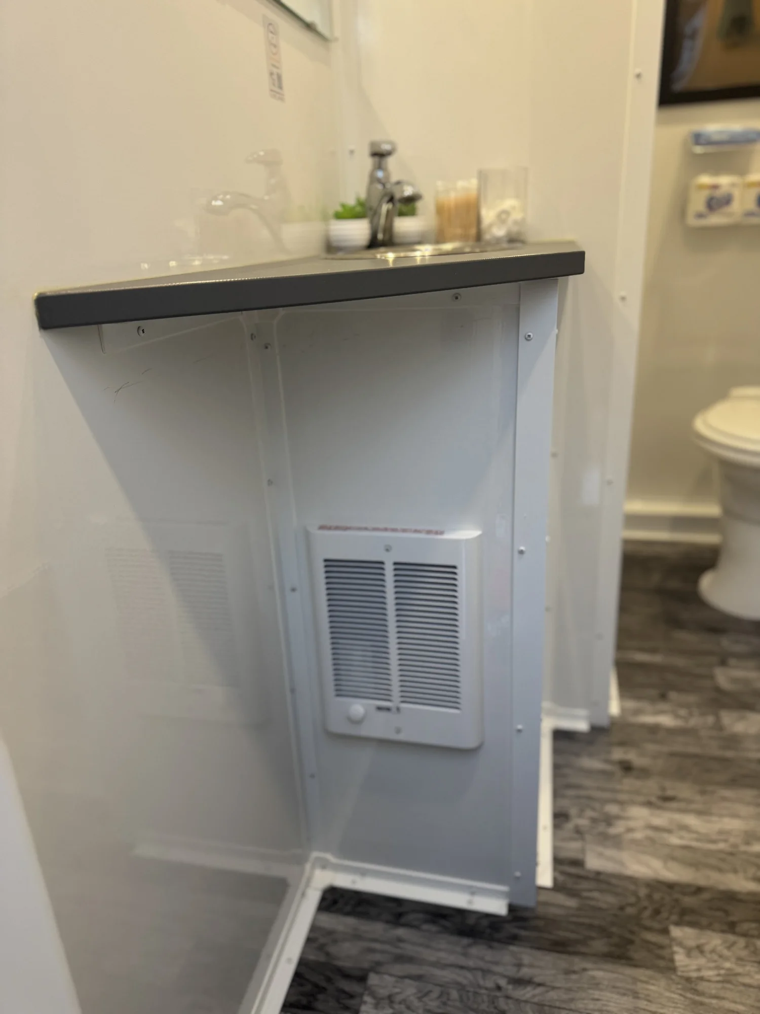 Close-up of heater inside the restroom trailer