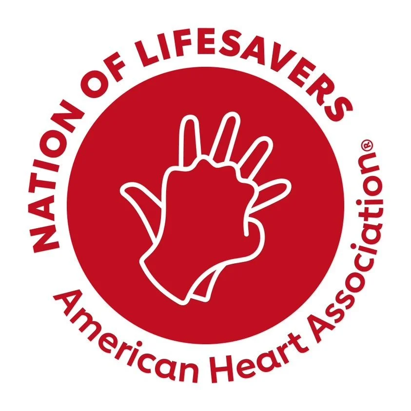 Logo of the National Lifesavers American Heart Association featuring a white outline of a hand with four fingers raised on a red circle background, encircled by the organization name in red text.