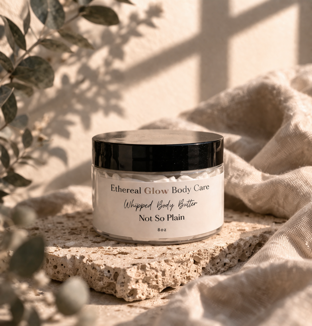 Ethereal glow body butter on stone.png